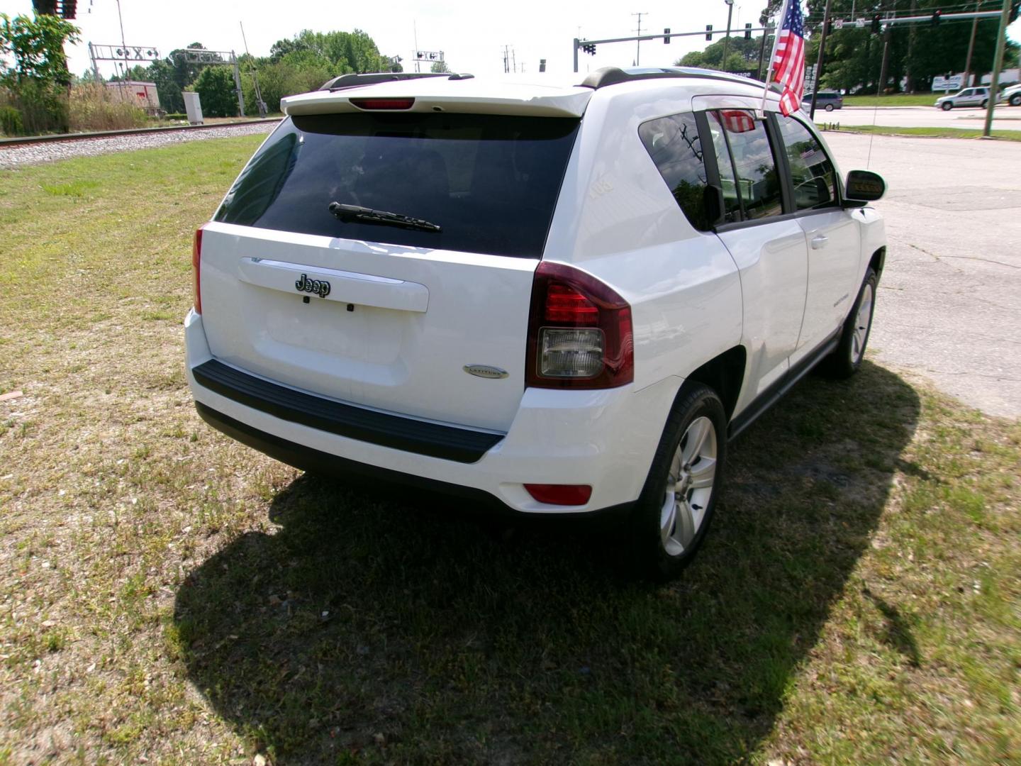 2014 White Jeep Compass Latitude FWD (1C4NJCEB9ED) with an 2.4L L4 DOHC 16V engine, Continuously Variable Transmission transmission, located at 2553 Airline Blvd, Portsmouth, VA, 23701, (757) 488-8331, 36.813889, -76.357597 - ***VEHICLE TERMS*** Down Payment: $899 Weekly Payment: $110 APR: 23.9% Repayment Terms: 42 Months *** CALL ELIZABETH SMITH - DIRECTOR OF MARKETING @ 757-488-8331 TO SCHEDULE YOUR APPOINTMENT TODAY AND GET PRE-APPROVED RIGHT OVER THE PHONE*** - Photo#5