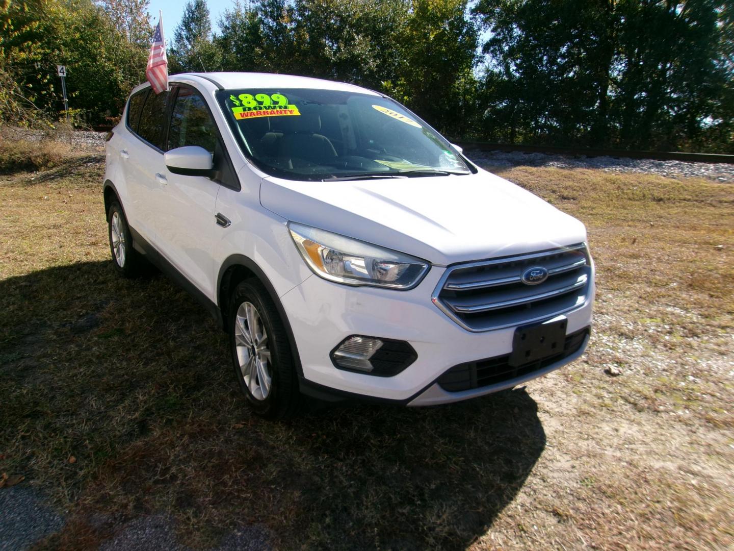 2017 White Ford Escape SE 4WD (1FMCU9GD2HU) with an 1.5L L4 DOHC 16V engine, 6A transmission, located at 2553 Airline Blvd, Portsmouth, VA, 23701, (757) 488-8331, 36.813889, -76.357597 - ***VEHICLE TERMS*** Down Payment: $899 Weekly Payment: $115 APR: 23.9% Repayment Terms: 42 Months *** CALL ELIZABETH SMITH - DIRECTOR OF MARKETING @ 757-488-8331 TO SCHEDULE YOUR APPOINTMENT TODAY AND GET PRE-APPROVED RIGHT OVER THE PHONE*** - Photo#3