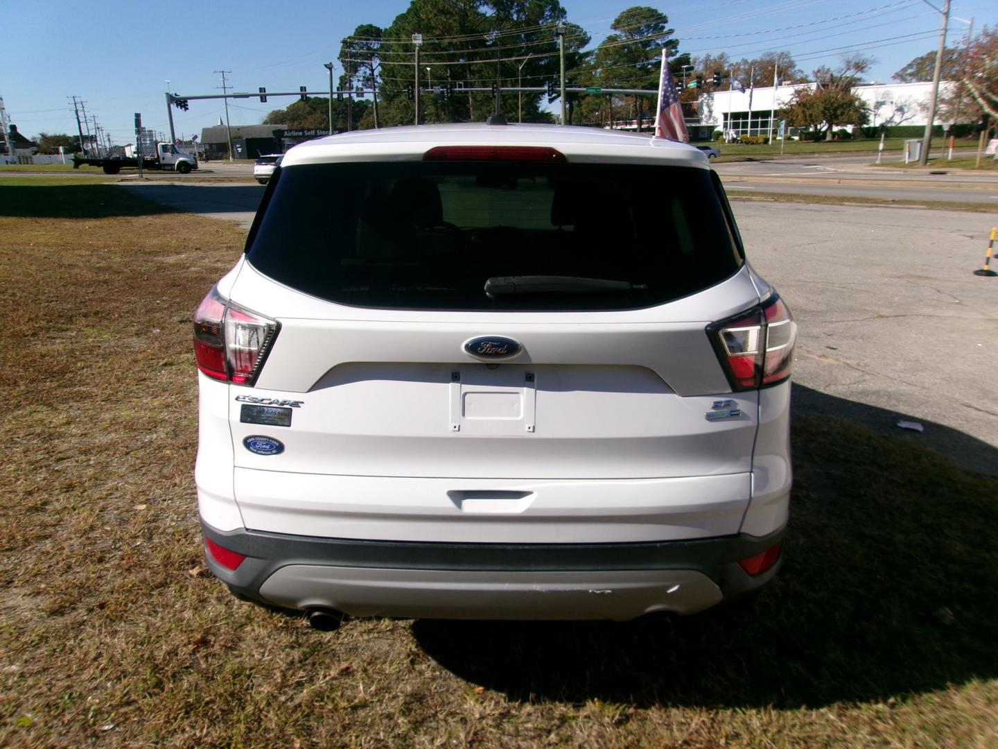 2017 White Ford Escape SE 4WD (1FMCU9GD2HU) with an 1.5L L4 DOHC 16V engine, 6A transmission, located at 2553 Airline Blvd, Portsmouth, VA, 23701, (757) 488-8331, 36.813889, -76.357597 - ***VEHICLE TERMS*** Down Payment: $899 Weekly Payment: $115 APR: 23.9% Repayment Terms: 42 Months *** CALL ELIZABETH SMITH - DIRECTOR OF MARKETING @ 757-488-8331 TO SCHEDULE YOUR APPOINTMENT TODAY AND GET PRE-APPROVED RIGHT OVER THE PHONE*** - Photo#6