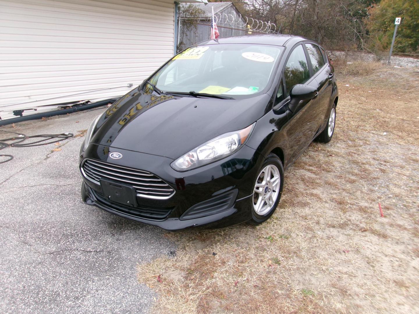 2019 Black Ford Fiesta SE Hatchback (3FADP4EJ3KM) with an 1.6L L4 DOHC 16V engine, located at 2553 Airline Blvd, Portsmouth, VA, 23701, (757) 488-8331, 36.813889, -76.357597 - ***VEHICLE TERMS*** Down Payment: $699 Weekly Payment: $110 APR: 23.9% Repayment Terms: 42 Months *** CALL ELIZABETH SMITH - DIRECTOR OF MARKETING @ 757-488-8331 TO SCHEDULE YOUR APPOINTMENT TODAY AND GET PRE-APPROVED RIGHT OVER THE PHONE*** - Photo#1