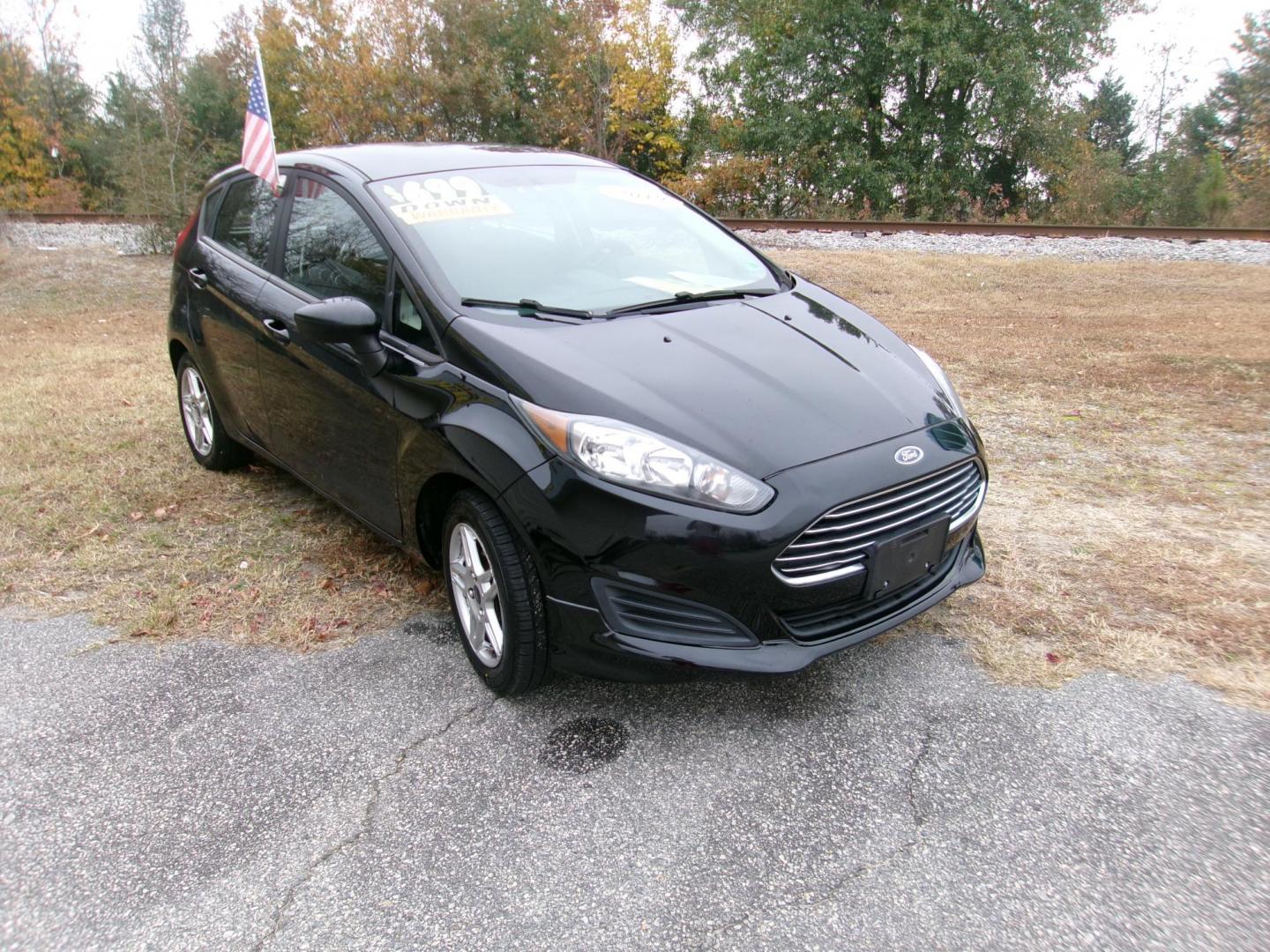 2019 Black Ford Fiesta SE Hatchback (3FADP4EJ3KM) with an 1.6L L4 DOHC 16V engine, located at 2553 Airline Blvd, Portsmouth, VA, 23701, (757) 488-8331, 36.813889, -76.357597 - ***VEHICLE TERMS*** Down Payment: $699 Weekly Payment: $110 APR: 23.9% Repayment Terms: 42 Months *** CALL ELIZABETH SMITH - DIRECTOR OF MARKETING @ 757-488-8331 TO SCHEDULE YOUR APPOINTMENT TODAY AND GET PRE-APPROVED RIGHT OVER THE PHONE*** - Photo#3