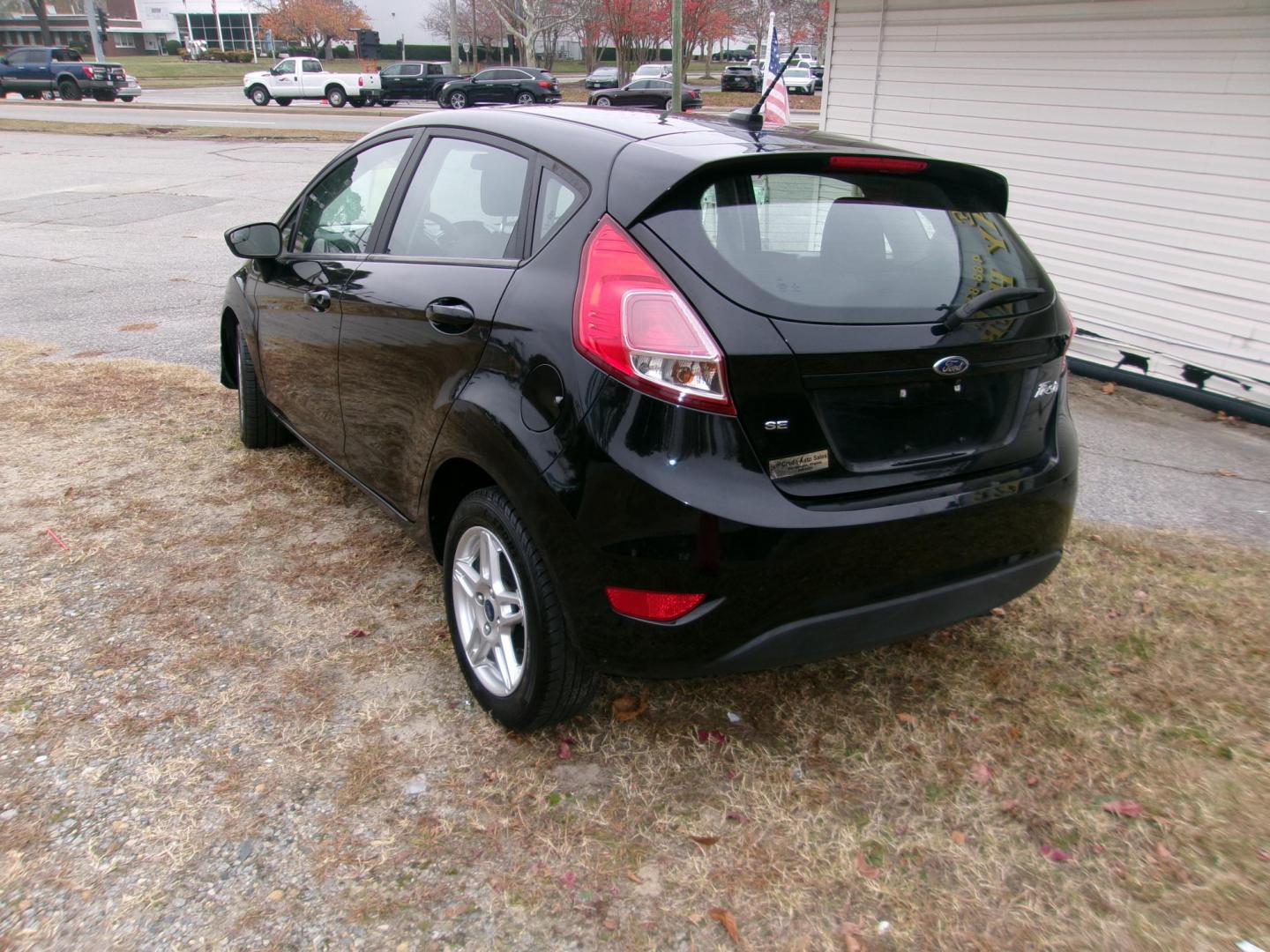 2019 Black Ford Fiesta SE Hatchback (3FADP4EJ3KM) with an 1.6L L4 DOHC 16V engine, located at 2553 Airline Blvd, Portsmouth, VA, 23701, (757) 488-8331, 36.813889, -76.357597 - ***VEHICLE TERMS*** Down Payment: $699 Weekly Payment: $110 APR: 23.9% Repayment Terms: 42 Months *** CALL ELIZABETH SMITH - DIRECTOR OF MARKETING @ 757-488-8331 TO SCHEDULE YOUR APPOINTMENT TODAY AND GET PRE-APPROVED RIGHT OVER THE PHONE*** - Photo#7