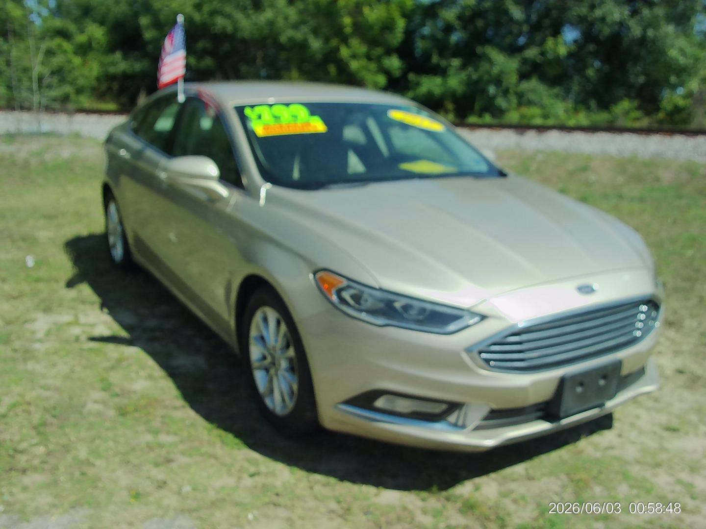 2017 Tan Ford Fusion SE (3FA6P0HD5HR) with an 1.5L L4 DOHC 16V engine, 6A transmission, located at 2553 Airline Blvd, Portsmouth, VA, 23701, (757) 488-8331, 36.813889, -76.357597 - ***VEHICLE TERMS*** Down Payment: $799 Weekly Payment: $105 APR: 23.9% Repayment Terms: 42 Months *** CALL ELIZABETH SMITH - DIRECTOR OF MARKETING @ 757-488-8331 TO SCHEDULE YOUR APPOINTMENT TODAY AND GET PRE-APPROVED RIGHT OVER THE PHONE*** - Photo#3