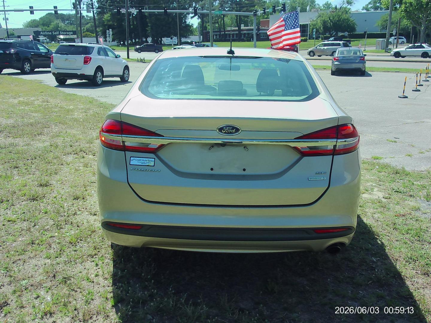 2017 Tan Ford Fusion SE (3FA6P0HD5HR) with an 1.5L L4 DOHC 16V engine, 6A transmission, located at 2553 Airline Blvd, Portsmouth, VA, 23701, (757) 488-8331, 36.813889, -76.357597 - ***VEHICLE TERMS*** Down Payment: $799 Weekly Payment: $105 APR: 23.9% Repayment Terms: 42 Months *** CALL ELIZABETH SMITH - DIRECTOR OF MARKETING @ 757-488-8331 TO SCHEDULE YOUR APPOINTMENT TODAY AND GET PRE-APPROVED RIGHT OVER THE PHONE*** - Photo#6
