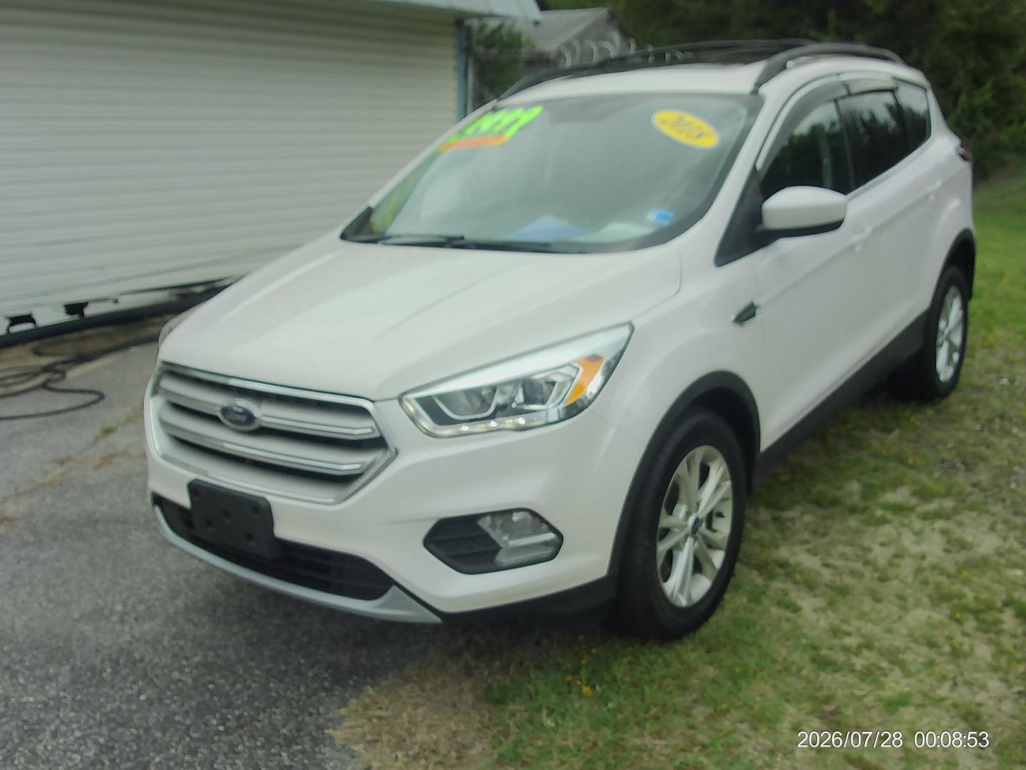 2018 White Ford Escape SEL 4WD (1FMCU9HD4JU) with an 1.5L L4 DOHC 16V engine, 6A transmission, located at 2553 Airline Blvd, Portsmouth, VA, 23701, (757) 488-8331, 36.813889, -76.357597 - ***VEHICLE TERMS*** Down Payment: $1499 Weekly Payment: $125 APR: 23.9% Repayment Terms: 42 Months *** CALL ELIZABETH SMITH - DIRECTOR OF MARKETING @ 757-488-8331 TO SCHEDULE YOUR APPOINTMENT TODAY AND GET PRE-APPROVED RIGHT OVER THE PHONE***- Photo#1