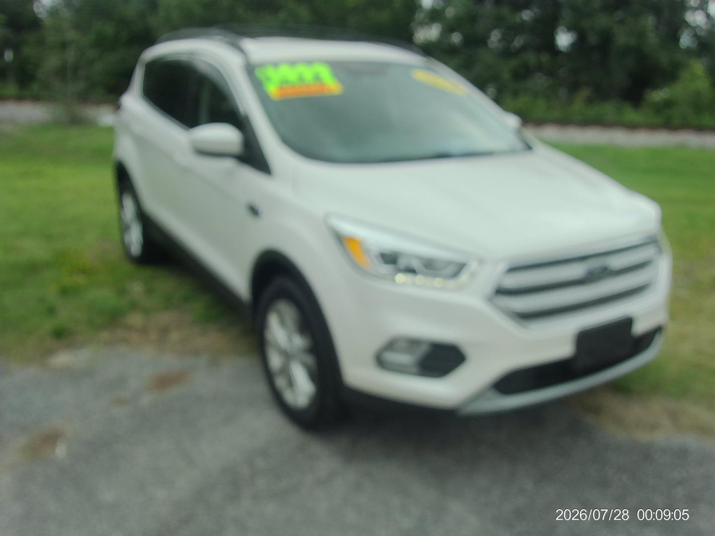 2018 White Ford Escape SEL 4WD (1FMCU9HD4JU) with an 1.5L L4 DOHC 16V engine, 6A transmission, located at 2553 Airline Blvd, Portsmouth, VA, 23701, (757) 488-8331, 36.813889, -76.357597 - ***VEHICLE TERMS*** Down Payment: $1499 Weekly Payment: $125 APR: 23.9% Repayment Terms: 42 Months *** CALL ELIZABETH SMITH - DIRECTOR OF MARKETING @ 757-488-8331 TO SCHEDULE YOUR APPOINTMENT TODAY AND GET PRE-APPROVED RIGHT OVER THE PHONE***- Photo#3
