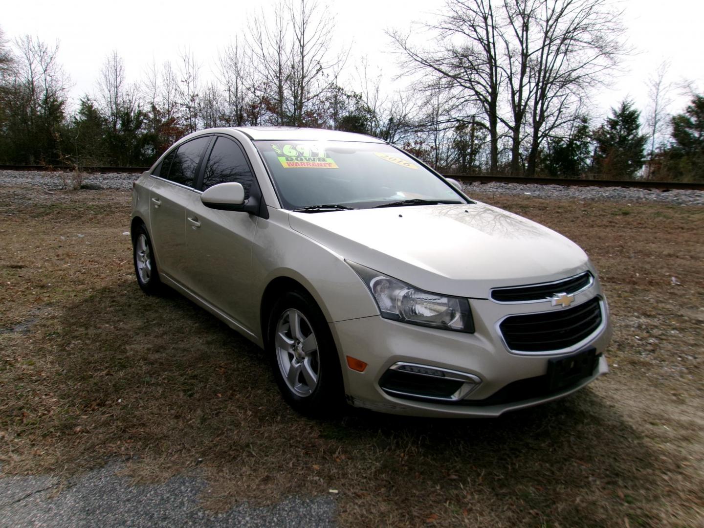 2016 Gold Chevrolet Cruze 2LT Auto (1G1PE5SB1G7) with an 1.4L L4 DOHC 16V TURBO engine, 6-Speed Automatic transmission, located at 2553 Airline Blvd, Portsmouth, VA, 23701, (757) 488-8331, 36.813889, -76.357597 - ***VEHICLE TERMS*** Down Payment: $699 Weekly Payment: $105 APR: 23.9% Repayment Terms: 42 Months *** CALL ELIZABETH SMITH - DIRECTOR OF MARKETING @ 757-488-8331 TO SCHEDULE YOUR APPOINTMENT TODAY AND GET PRE-APPROVED RIGHT OVER THE PHONE*** - Photo#3