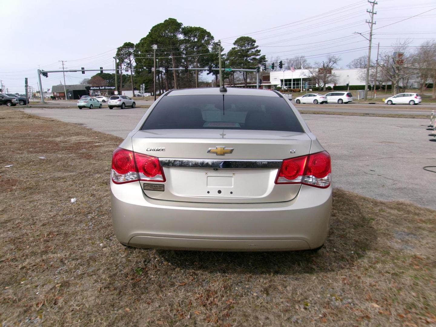 2016 Gold Chevrolet Cruze 2LT Auto (1G1PE5SB1G7) with an 1.4L L4 DOHC 16V TURBO engine, 6-Speed Automatic transmission, located at 2553 Airline Blvd, Portsmouth, VA, 23701, (757) 488-8331, 36.813889, -76.357597 - ***VEHICLE TERMS*** Down Payment: $699 Weekly Payment: $105 APR: 23.9% Repayment Terms: 42 Months *** CALL ELIZABETH SMITH - DIRECTOR OF MARKETING @ 757-488-8331 TO SCHEDULE YOUR APPOINTMENT TODAY AND GET PRE-APPROVED RIGHT OVER THE PHONE*** - Photo#7