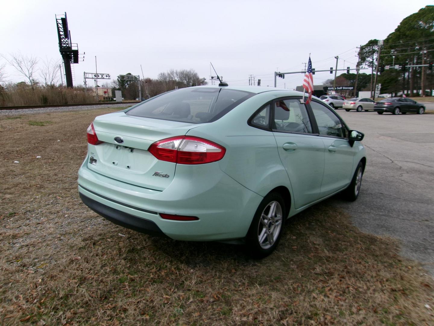 2018 Green Ford Fiesta SE Sedan (3FADP4BJ6JM) with an 1.6L L4 DOHC 16V engine, located at 2553 Airline Blvd, Portsmouth, VA, 23701, (757) 488-8331, 36.813889, -76.357597 - ***VEHICLE TERMS*** Down Payment: $799 Weekly Payment: $110 APR: 23.9% Repayment Terms: 42 Months *** CALL ELIZABETH SMITH - DIRECTOR OF MARKETING @ 757-488-8331 TO SCHEDULE YOUR APPOINTMENT TODAY AND GET PRE-APPROVED RIGHT OVER THE PHONE*** - Photo#4