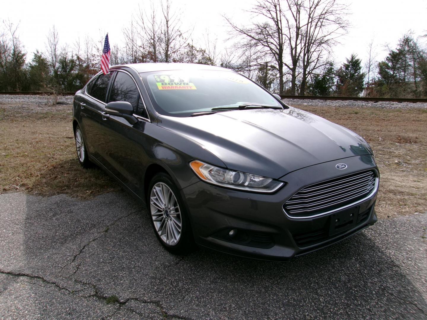 2016 Gray Ford Fusion SE AWD (3FA6P0T97GR) with an 2.0L L4 DOHC 16V engine, 6A transmission, located at 2553 Airline Blvd, Portsmouth, VA, 23701, (757) 488-8331, 36.813889, -76.357597 - ***VEHICLE TERMS*** Down Payment: $899 Weekly Payment: $110 APR: 23.9% Repayment Terms: 42 Months *** CALL ELIZABETH SMITH - DIRECTOR OF MARKETING @ 757-488-8331 TO SCHEDULE YOUR APPOINTMENT TODAY AND GET PRE-APPROVED RIGHT OVER THE PHONE*** - Photo#3