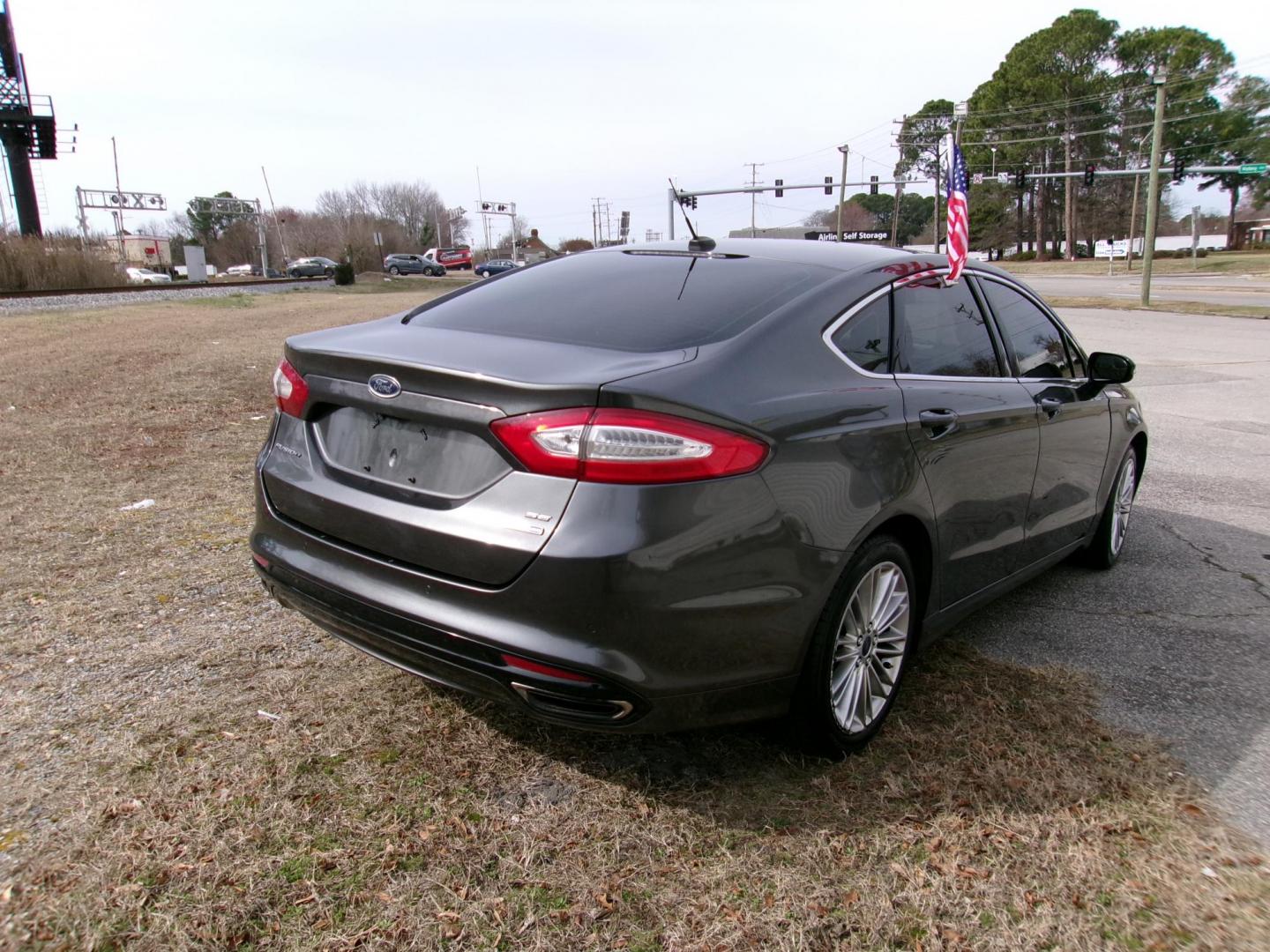 2016 Gray Ford Fusion SE AWD (3FA6P0T97GR) with an 2.0L L4 DOHC 16V engine, 6A transmission, located at 2553 Airline Blvd, Portsmouth, VA, 23701, (757) 488-8331, 36.813889, -76.357597 - ***VEHICLE TERMS*** Down Payment: $899 Weekly Payment: $110 APR: 23.9% Repayment Terms: 42 Months *** CALL ELIZABETH SMITH - DIRECTOR OF MARKETING @ 757-488-8331 TO SCHEDULE YOUR APPOINTMENT TODAY AND GET PRE-APPROVED RIGHT OVER THE PHONE*** - Photo#4