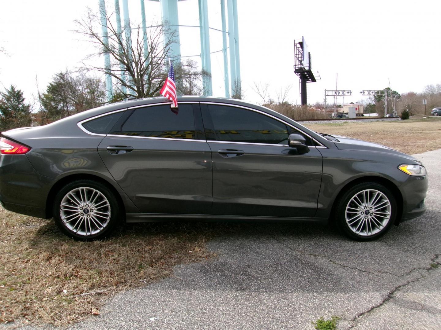 2016 Gray Ford Fusion SE AWD (3FA6P0T97GR) with an 2.0L L4 DOHC 16V engine, 6A transmission, located at 2553 Airline Blvd, Portsmouth, VA, 23701, (757) 488-8331, 36.813889, -76.357597 - ***VEHICLE TERMS*** Down Payment: $899 Weekly Payment: $110 APR: 23.9% Repayment Terms: 42 Months *** CALL ELIZABETH SMITH - DIRECTOR OF MARKETING @ 757-488-8331 TO SCHEDULE YOUR APPOINTMENT TODAY AND GET PRE-APPROVED RIGHT OVER THE PHONE*** - Photo#5