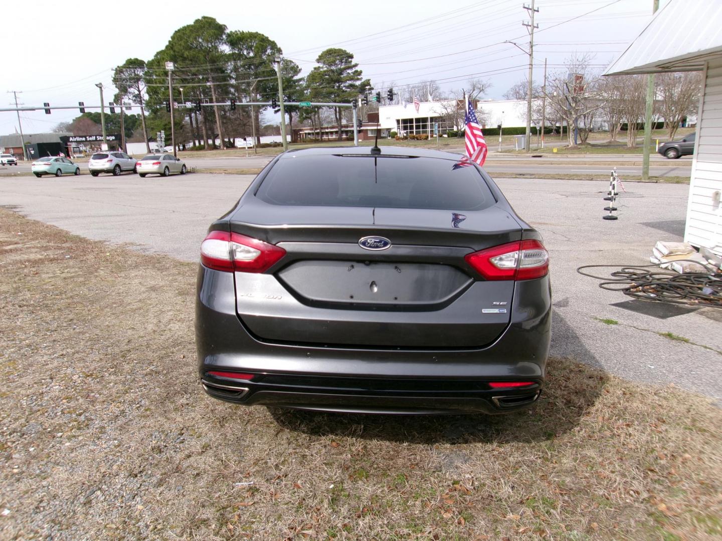 2016 Gray Ford Fusion SE AWD (3FA6P0T97GR) with an 2.0L L4 DOHC 16V engine, 6A transmission, located at 2553 Airline Blvd, Portsmouth, VA, 23701, (757) 488-8331, 36.813889, -76.357597 - ***VEHICLE TERMS*** Down Payment: $899 Weekly Payment: $110 APR: 23.9% Repayment Terms: 42 Months *** CALL ELIZABETH SMITH - DIRECTOR OF MARKETING @ 757-488-8331 TO SCHEDULE YOUR APPOINTMENT TODAY AND GET PRE-APPROVED RIGHT OVER THE PHONE*** - Photo#6