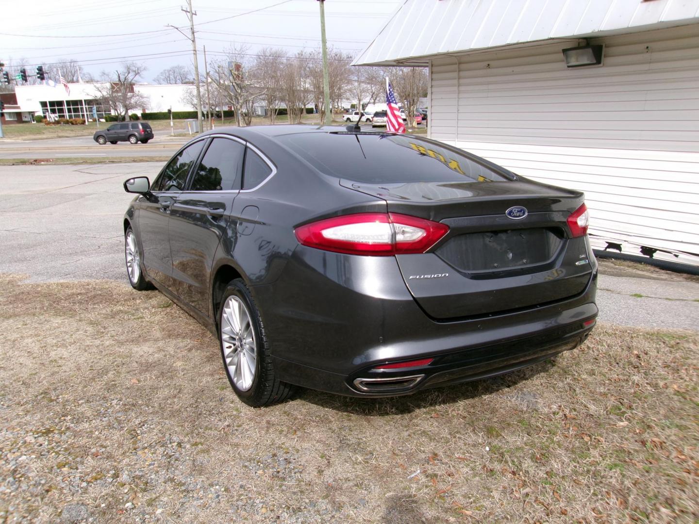 2016 Gray Ford Fusion SE AWD (3FA6P0T97GR) with an 2.0L L4 DOHC 16V engine, 6A transmission, located at 2553 Airline Blvd, Portsmouth, VA, 23701, (757) 488-8331, 36.813889, -76.357597 - ***VEHICLE TERMS*** Down Payment: $899 Weekly Payment: $110 APR: 23.9% Repayment Terms: 42 Months *** CALL ELIZABETH SMITH - DIRECTOR OF MARKETING @ 757-488-8331 TO SCHEDULE YOUR APPOINTMENT TODAY AND GET PRE-APPROVED RIGHT OVER THE PHONE*** - Photo#7