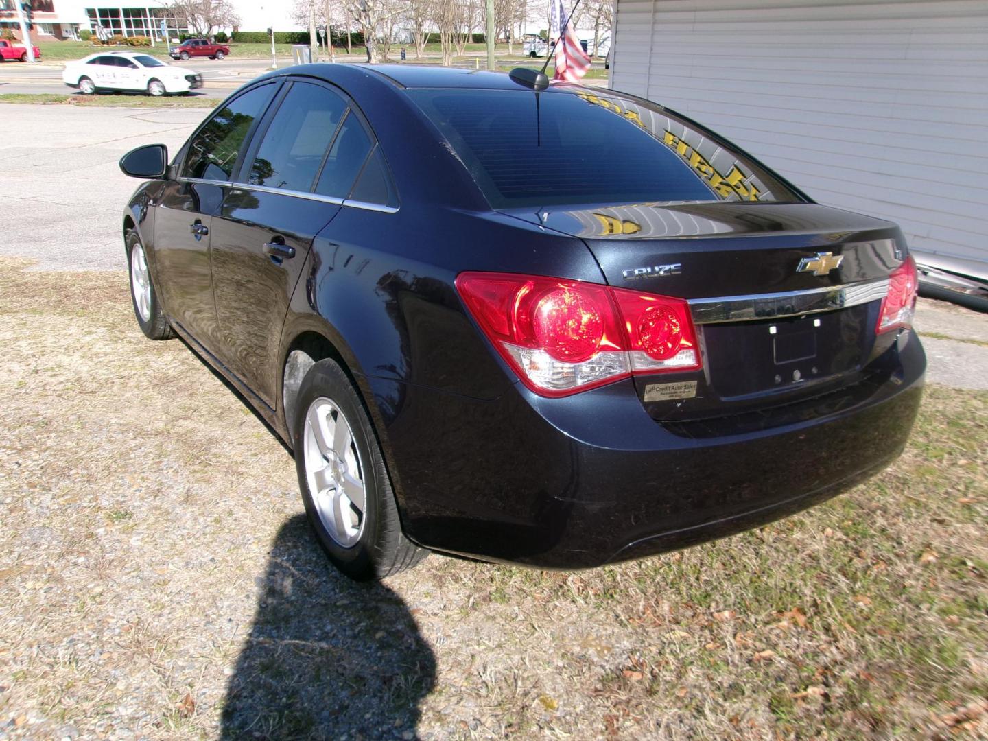 2016 Black Chevrolet Cruze 2LT Auto (1G1PE5SB8G7) with an 1.4L L4 DOHC 16V TURBO engine, 6-Speed Automatic transmission, located at 2553 Airline Blvd, Portsmouth, VA, 23701, (757) 488-8331, 36.813889, -76.357597 - ***VEHICLE TERMS*** Down Payment: $999 Weekly Payment: $115 APR: 23.9% Repayment Terms: 42 Months *** CALL ELIZABETH SMITH - DIRECTOR OF MARKETING @ 757-488-8331 TO SCHEDULE YOUR APPOINTMENT TODAY AND GET PRE-APPROVED RIGHT OVER THE PHONE*** - Photo#6