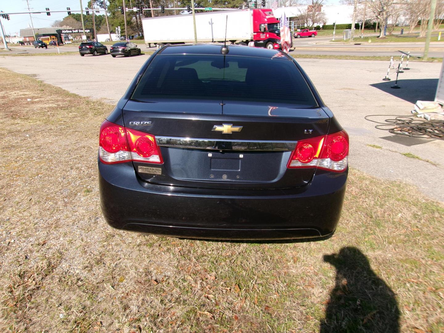 2016 Black Chevrolet Cruze 2LT Auto (1G1PE5SB8G7) with an 1.4L L4 DOHC 16V TURBO engine, 6-Speed Automatic transmission, located at 2553 Airline Blvd, Portsmouth, VA, 23701, (757) 488-8331, 36.813889, -76.357597 - ***VEHICLE TERMS*** Down Payment: $999 Weekly Payment: $115 APR: 23.9% Repayment Terms: 42 Months *** CALL ELIZABETH SMITH - DIRECTOR OF MARKETING @ 757-488-8331 TO SCHEDULE YOUR APPOINTMENT TODAY AND GET PRE-APPROVED RIGHT OVER THE PHONE*** - Photo#7