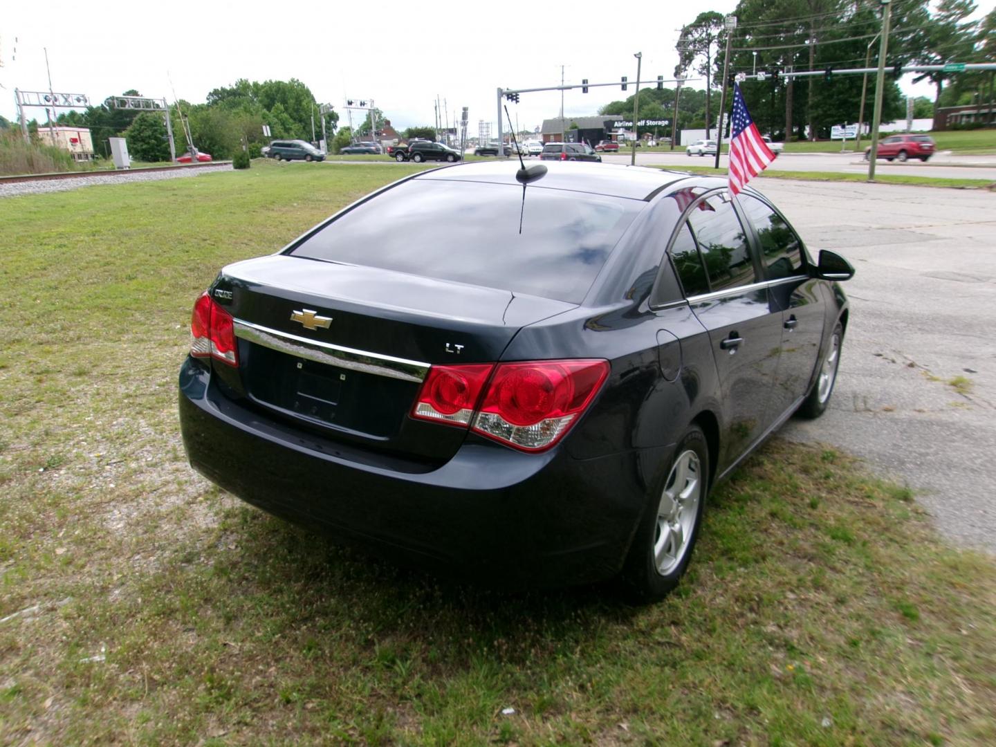2016 Black Chevrolet Cruze 2LT Auto (1G1PE5SB8G7) with an 1.4L L4 DOHC 16V TURBO engine, 6-Speed Automatic transmission, located at 2553 Airline Blvd, Portsmouth, VA, 23701, (757) 488-8331, 36.813889, -76.357597 - ***VEHICLE TERMS*** Down Payment: $799 Weekly Payment: $115 APR: 23.9% Repayment Terms: 42 Months *** CALL ELIZABETH SMITH - DIRECTOR OF MARKETING @ 757-488-8331 TO SCHEDULE YOUR APPOINTMENT TODAY AND GET PRE-APPROVED RIGHT OVER THE PHONE*** - Photo#5