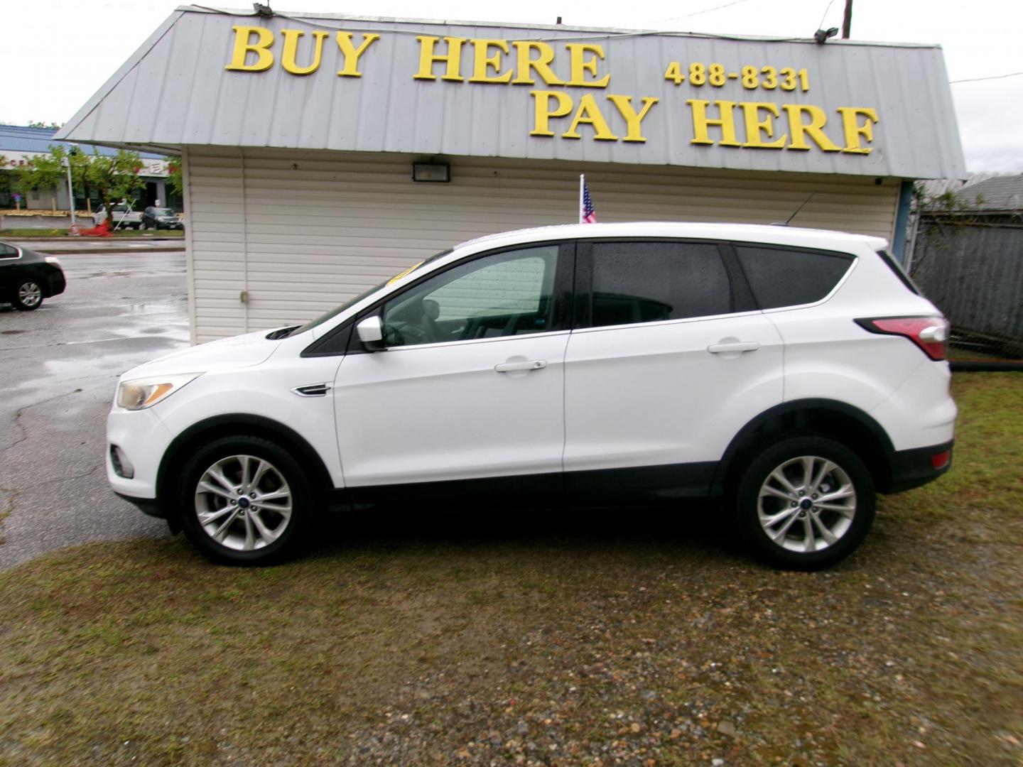 2017 White Ford Escape SE FWD (1FMCU0GD0HU) with an 1.5L L4 DOHC 16V engine, 6A transmission, located at 2553 Airline Blvd, Portsmouth, VA, 23701, (757) 488-8331, 36.813889, -76.357597 - ***VEHICLE TERMS*** Down Payment: $999 Weekly Payment: $115 APR: 23.9% Repayment Terms: 42 Months *** CALL ELIZABETH SMITH - DIRECTOR OF MARKETING @ 757-488-8331 TO SCHEDULE YOUR APPOINTMENT TODAY AND GET PRE-APPROVED RIGHT OVER THE PHONE*** - Photo#0