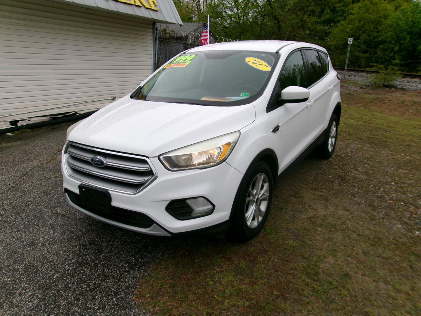 2017 White Ford Escape SE FWD (1FMCU0GD0HU) with an 1.5L L4 DOHC 16V engine, 6A transmission, located at 2553 Airline Blvd, Portsmouth, VA, 23701, (757) 488-8331, 36.813889, -76.357597 - ***VEHICLE TERMS*** Down Payment: $999 Weekly Payment: $115 APR: 23.9% Repayment Terms: 42 Months *** CALL ELIZABETH SMITH - DIRECTOR OF MARKETING @ 757-488-8331 TO SCHEDULE YOUR APPOINTMENT TODAY AND GET PRE-APPROVED RIGHT OVER THE PHONE*** - Photo#1