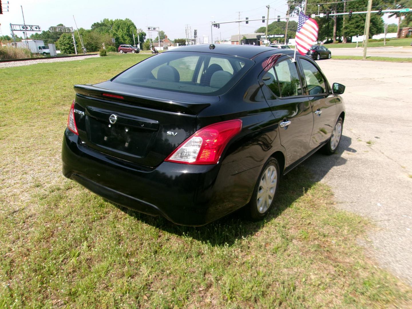 2019 Black Nissan Versa 1.6 SV Sedan (3N1CN7AP5KL) with an 1.6L L4 DOHC 16V engine, CVT transmission, located at 2553 Airline Blvd, Portsmouth, VA, 23701, (757) 488-8331, 36.813889, -76.357597 - ***VEHICLE TERMS*** Down Payment: $999 Weekly Payment: $115 APR: 23.9% Repayment Terms: 42 Months *** CALL ELIZABETH SMITH - DIRECTOR OF MARKETING @ 757-488-8331 TO SCHEDULE YOUR APPOINTMENT TODAY AND GET PRE-APPROVED RIGHT OVER THE PHONE*** - Photo#5
