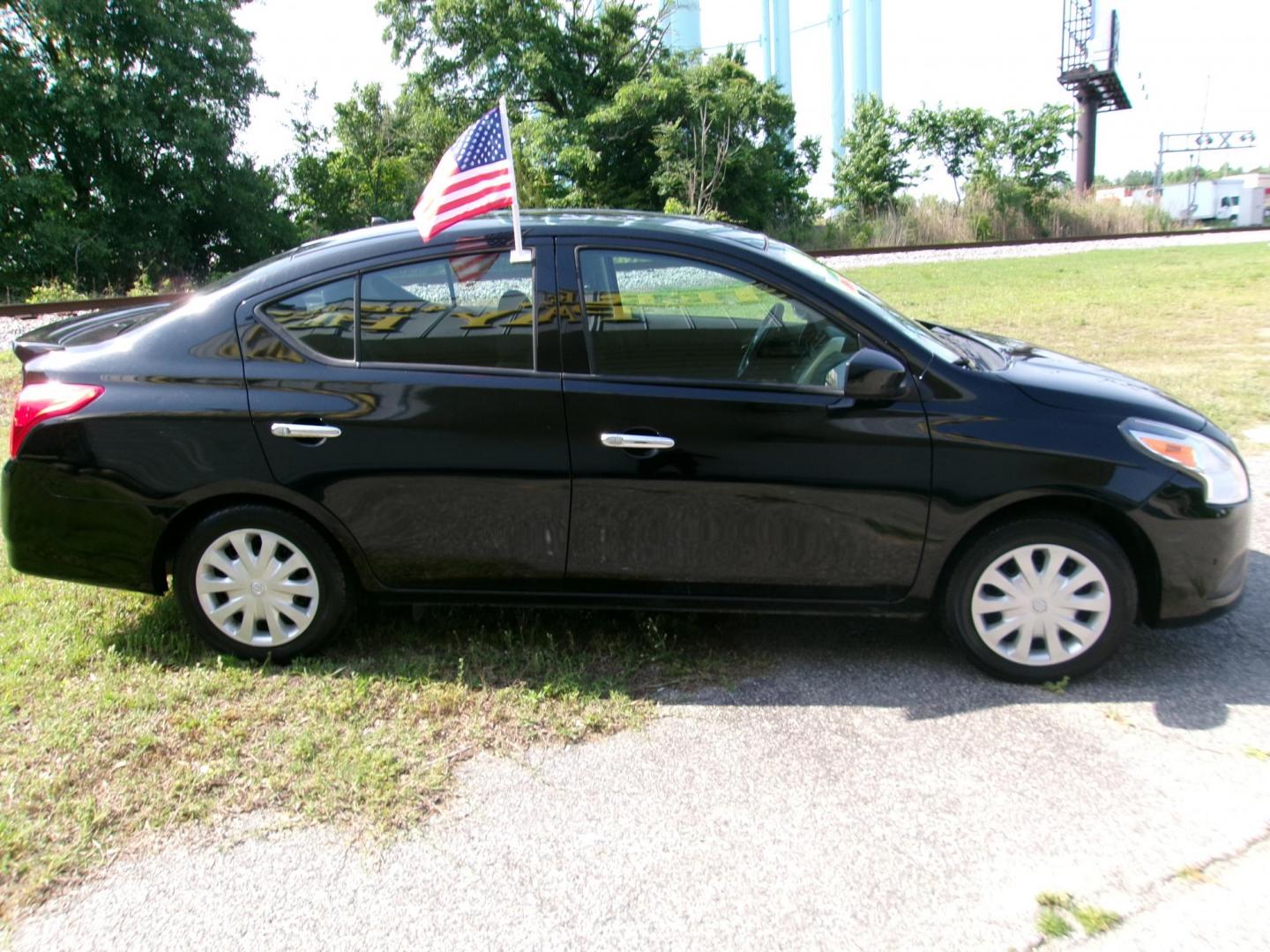 2019 Black Nissan Versa 1.6 SV Sedan (3N1CN7AP5KL) with an 1.6L L4 DOHC 16V engine, CVT transmission, located at 2553 Airline Blvd, Portsmouth, VA, 23701, (757) 488-8331, 36.813889, -76.357597 - ***VEHICLE TERMS*** Down Payment: $999 Weekly Payment: $115 APR: 23.9% Repayment Terms: 42 Months *** CALL ELIZABETH SMITH - DIRECTOR OF MARKETING @ 757-488-8331 TO SCHEDULE YOUR APPOINTMENT TODAY AND GET PRE-APPROVED RIGHT OVER THE PHONE*** - Photo#4