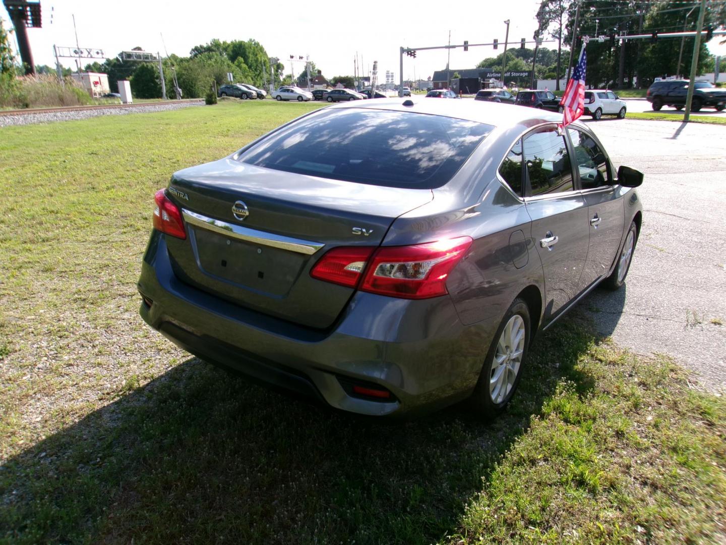 2018 Black Nissan Sentra S CVT (3N1AB7AP2JY) with an 1.8L L4 SFI DOHC 16V engine, CVT transmission, located at 2553 Airline Blvd, Portsmouth, VA, 23701, (757) 488-8331, 36.813889, -76.357597 - Photo#5