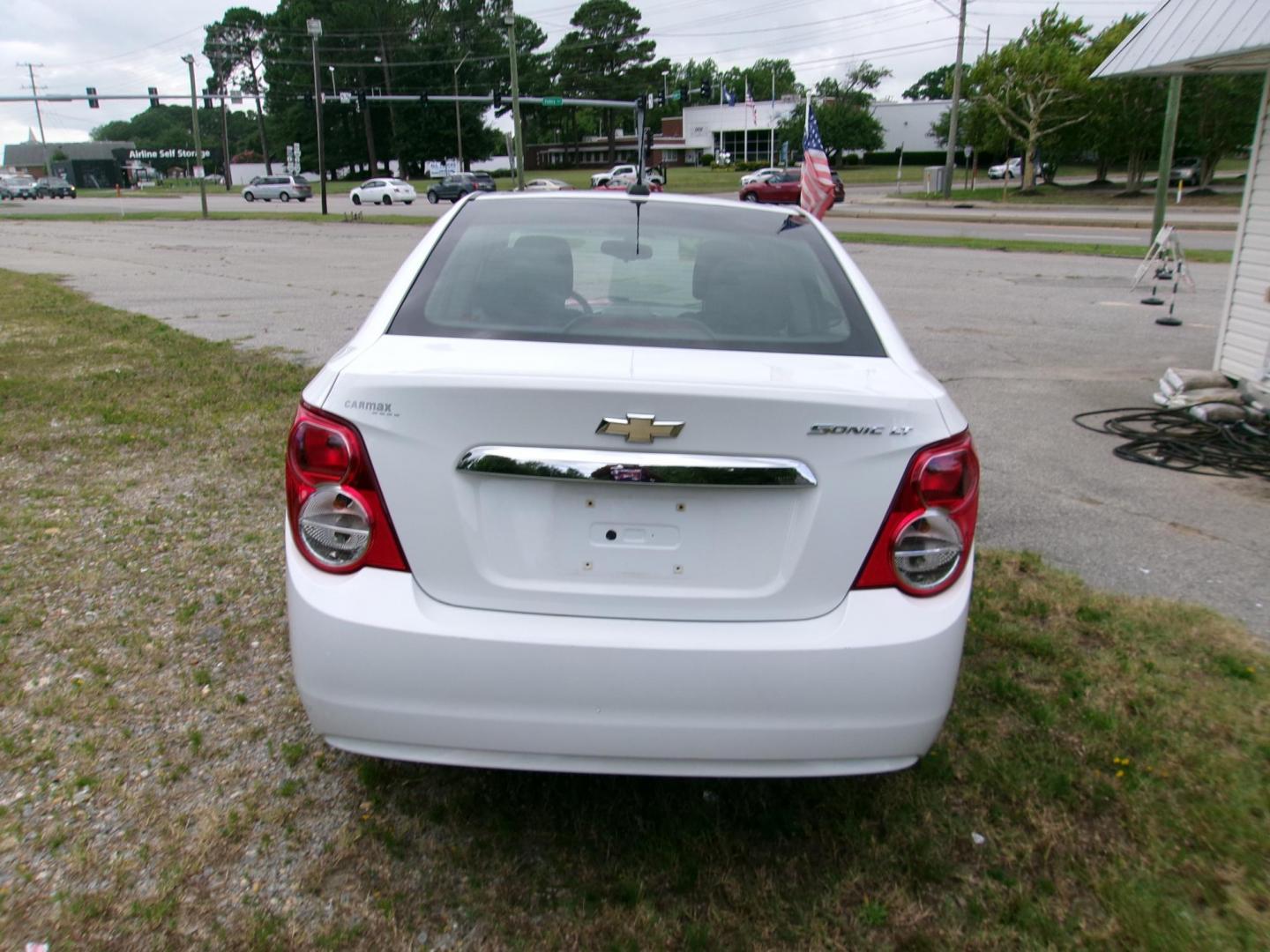 2016 White Chevrolet Sonic LT Auto Sedan (1G1JC5SGXG4) with an 1.8L L4 DOHC 24V engine, 6A transmission, located at 2553 Airline Blvd, Portsmouth, VA, 23701, (757) 488-8331, 36.813889, -76.357597 - ***VEHICLE TERMS*** Down Payment: $699 Weekly Payment: $110 APR: 23.9% Repayment Terms: 42 Months *** CALL ELIZABETH SMITH - DIRECTOR OF MARKETING @ 757-488-8331 TO SCHEDULE YOUR APPOINTMENT TODAY AND GET PRE-APPROVED RIGHT OVER THE PHONE*** - Photo#6
