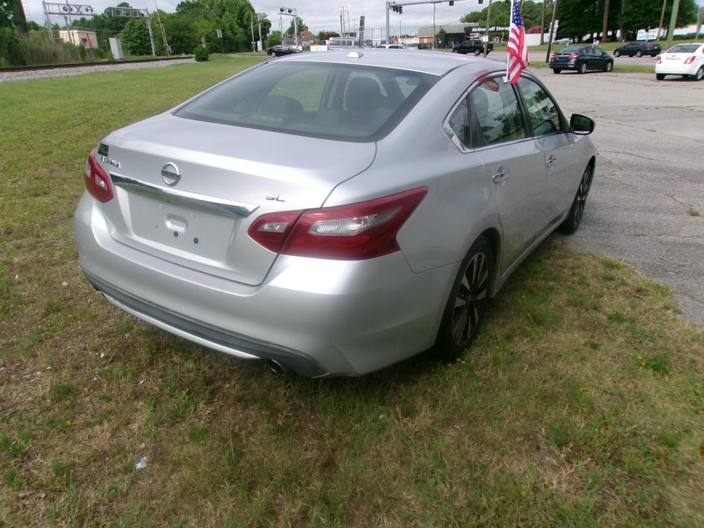 2018 Silver Nissan Altima 2.5 (1N4AL3AP8JC) with an 2.5L L4 DOHC 16V engine, CVT transmission, located at 2553 Airline Blvd, Portsmouth, VA, 23701, (757) 488-8331, 36.813889, -76.357597 - ***VEHICLE TERMS*** Down Payment: $1299 Weekly Payment: $120 APR: 23.9% Repayment Terms: 42 Months *** CALL ELIZABETH SMITH - DIRECTOR OF MARKETING @ 757-488-8331 TO SCHEDULE YOUR APPOINTMENT TODAY AND GET PRE-APPROVED RIGHT OVER THE PHONE*** - Photo#5