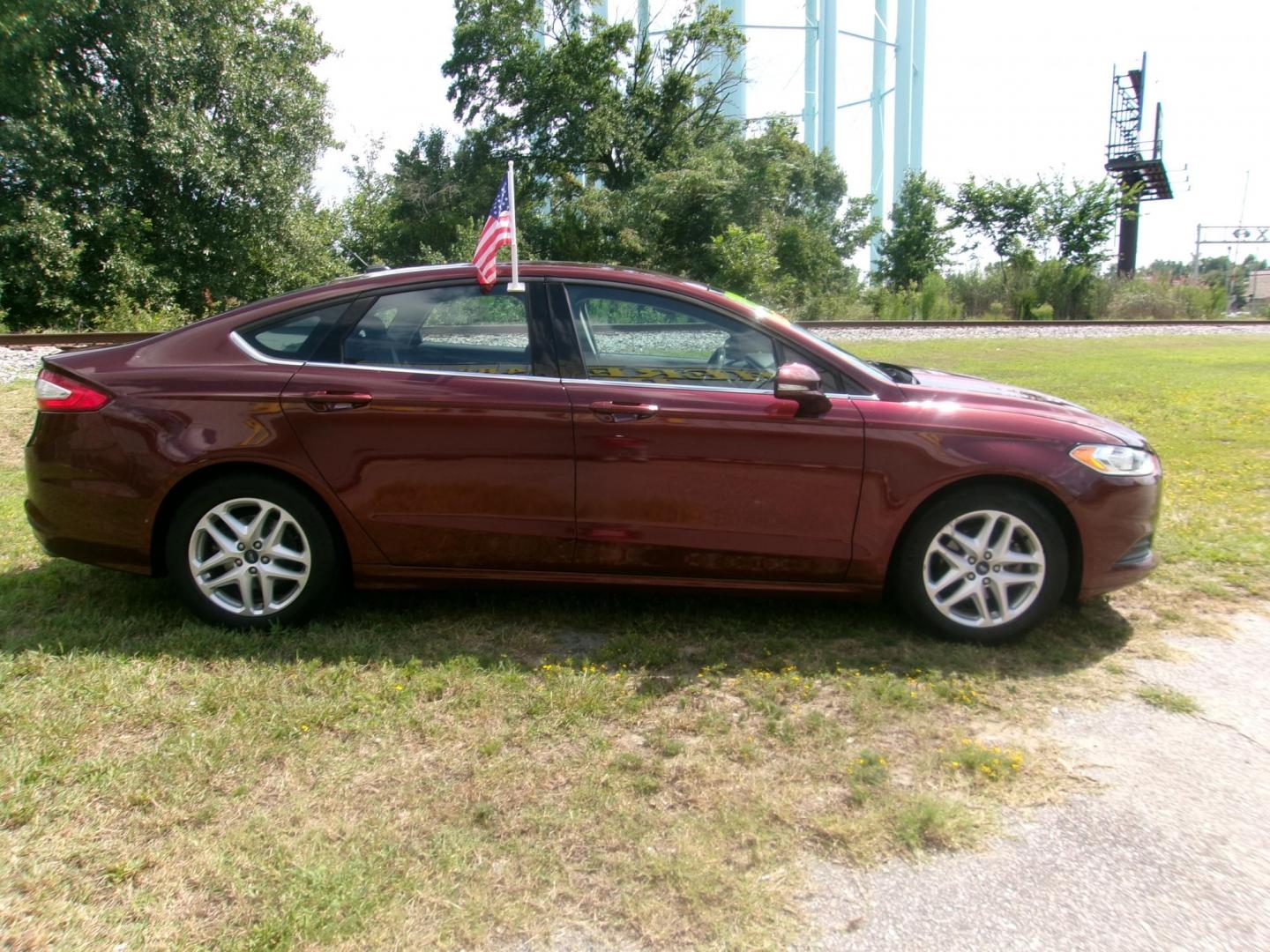 2016 Red Ford Fusion SE (3FA6P0H77GR) with an 2.5L L4 DOHC 16V engine, 6-Speed Automatic transmission, located at 2553 Airline Blvd, Portsmouth, VA, 23701, (757) 488-8331, 36.813889, -76.357597 - ***VEHICLE TERMS*** Down Payment: $899 Weekly Payment: $115 APR: 23.9% Repayment Terms: 42 Months *** CALL ELIZABETH SMITH - DIRECTOR OF MARKETING @ 757-488-8331 TO SCHEDULE YOUR APPOINTMENT TODAY AND GET PRE-APPROVED RIGHT OVER THE PHONE*** - Photo#4