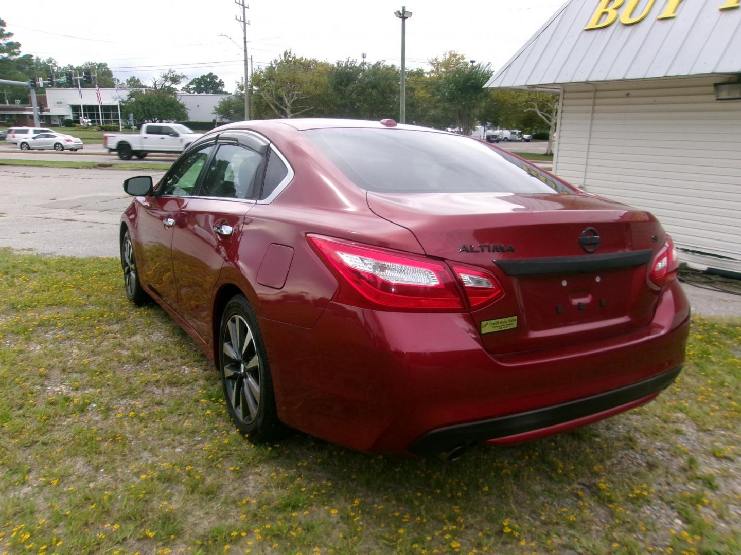 2016 Red Nissan Altima 2.5 SL (1N4AL3AP1GC) with an 2.5L L4 DOHC 16V engine, CVT transmission, located at 2553 Airline Blvd, Portsmouth, VA, 23701, (757) 488-8331, 36.813889, -76.357597 - ***VEHICLE TERMS*** Down Payment: $899 Weekly Payment: $110 APR: 23.9% Repayment Terms: 42 Months *** CALL ELIZABETH SMITH - DIRECTOR OF MARKETING @ 757-488-8331 TO SCHEDULE YOUR APPOINTMENT TODAY AND GET PRE-APPROVED RIGHT OVER THE PHONE*** - Photo#7