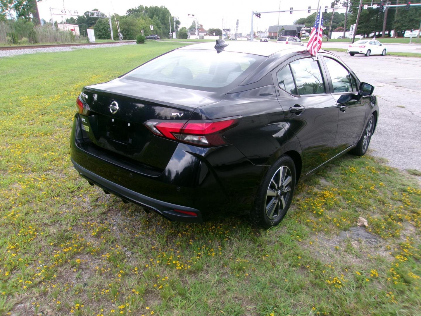 2020 Black Nissan Versa SV (3N1CN8EV4LL) with an 1.6L L4 DOHC 16V engine, CVT transmission, located at 2553 Airline Blvd, Portsmouth, VA, 23701, (757) 488-8331, 36.813889, -76.357597 - ***VEHICLE TERMS*** Down Payment: $999 Weekly Payment: $120 APR: 23.9% Repayment Terms: 42 Months *** CALL ELIZABETH SMITH - DIRECTOR OF MARKETING @ 757-488-8331 TO SCHEDULE YOUR APPOINTMENT TODAY AND GET PRE-APPROVED RIGHT OVER THE PHONE*** - Photo#5