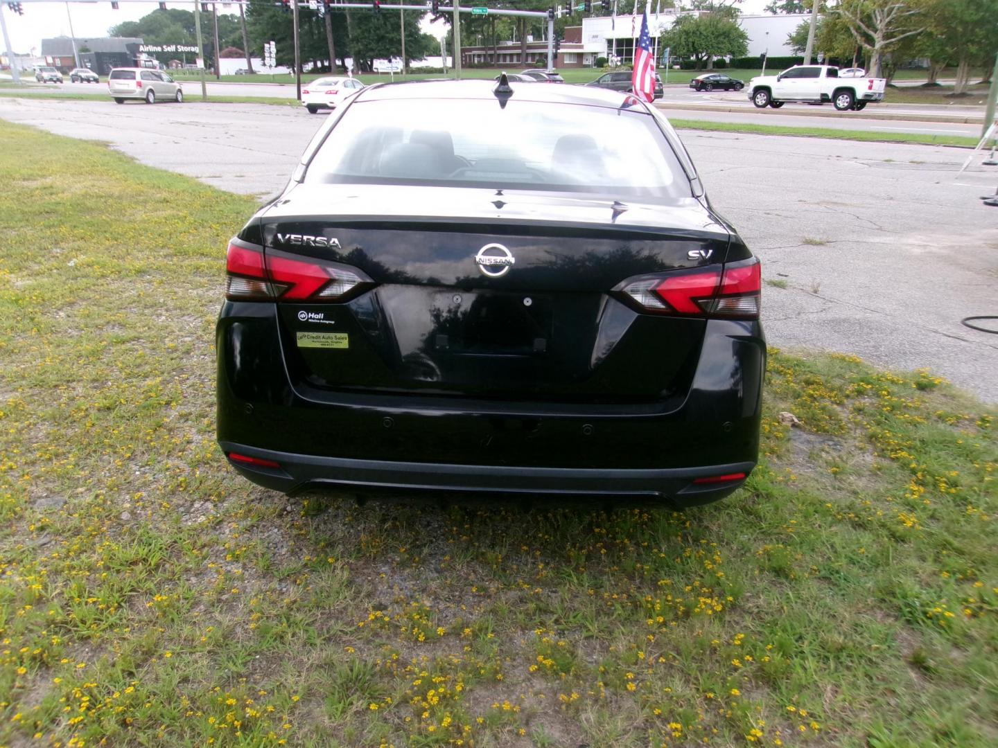 2020 Black Nissan Versa SV (3N1CN8EV4LL) with an 1.6L L4 DOHC 16V engine, CVT transmission, located at 2553 Airline Blvd, Portsmouth, VA, 23701, (757) 488-8331, 36.813889, -76.357597 - ***VEHICLE TERMS*** Down Payment: $999 Weekly Payment: $120 APR: 23.9% Repayment Terms: 42 Months *** CALL ELIZABETH SMITH - DIRECTOR OF MARKETING @ 757-488-8331 TO SCHEDULE YOUR APPOINTMENT TODAY AND GET PRE-APPROVED RIGHT OVER THE PHONE*** - Photo#6