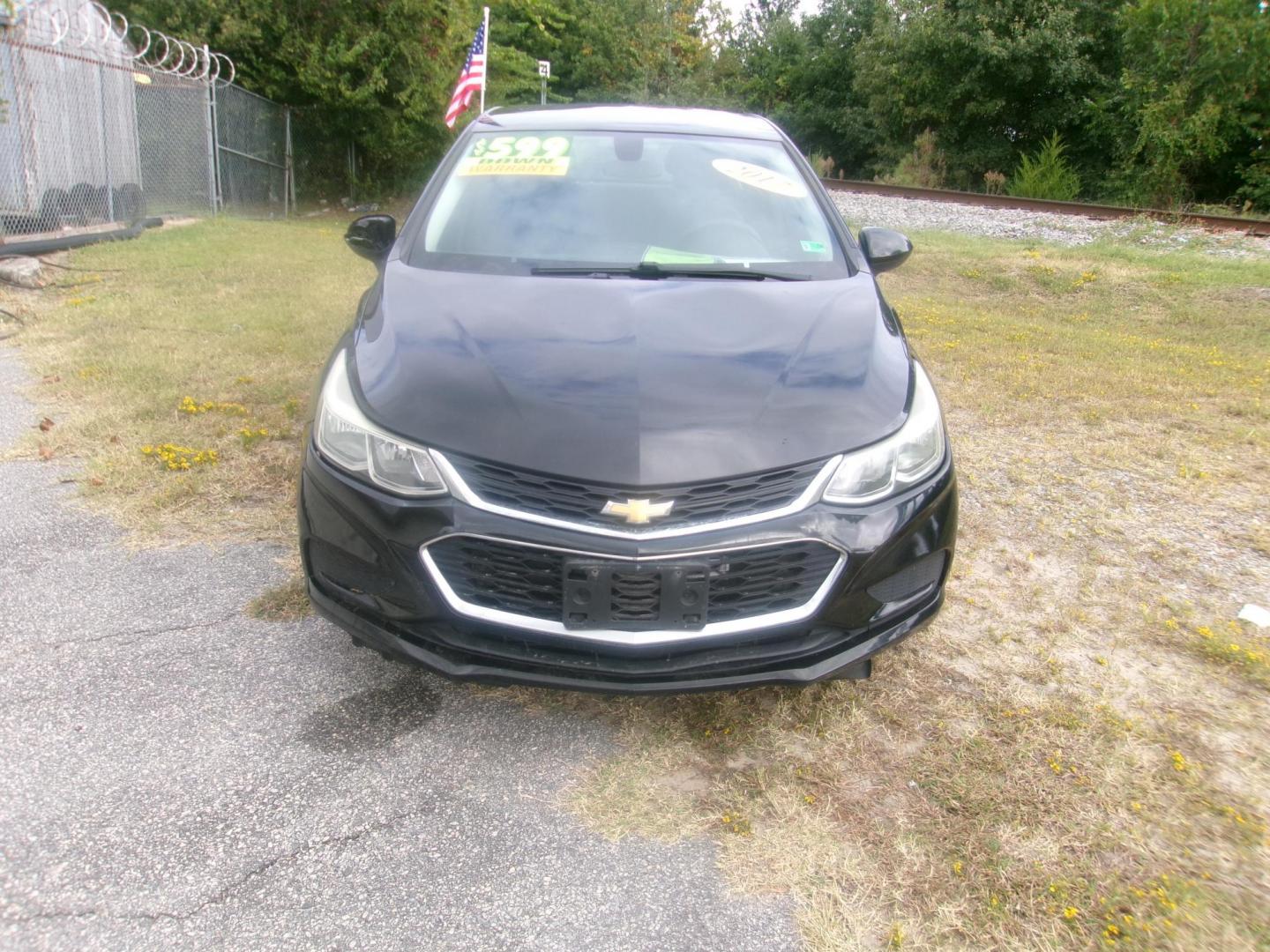2017 Black Chevrolet Cruze LS Auto (1G1BC5SM3H7) with an 1.4L L4 DOHC 16V TURBO engine, 6A transmission, located at 2553 Airline Blvd, Portsmouth, VA, 23701, (757) 488-8331, 36.813889, -76.357597 - Photo#2