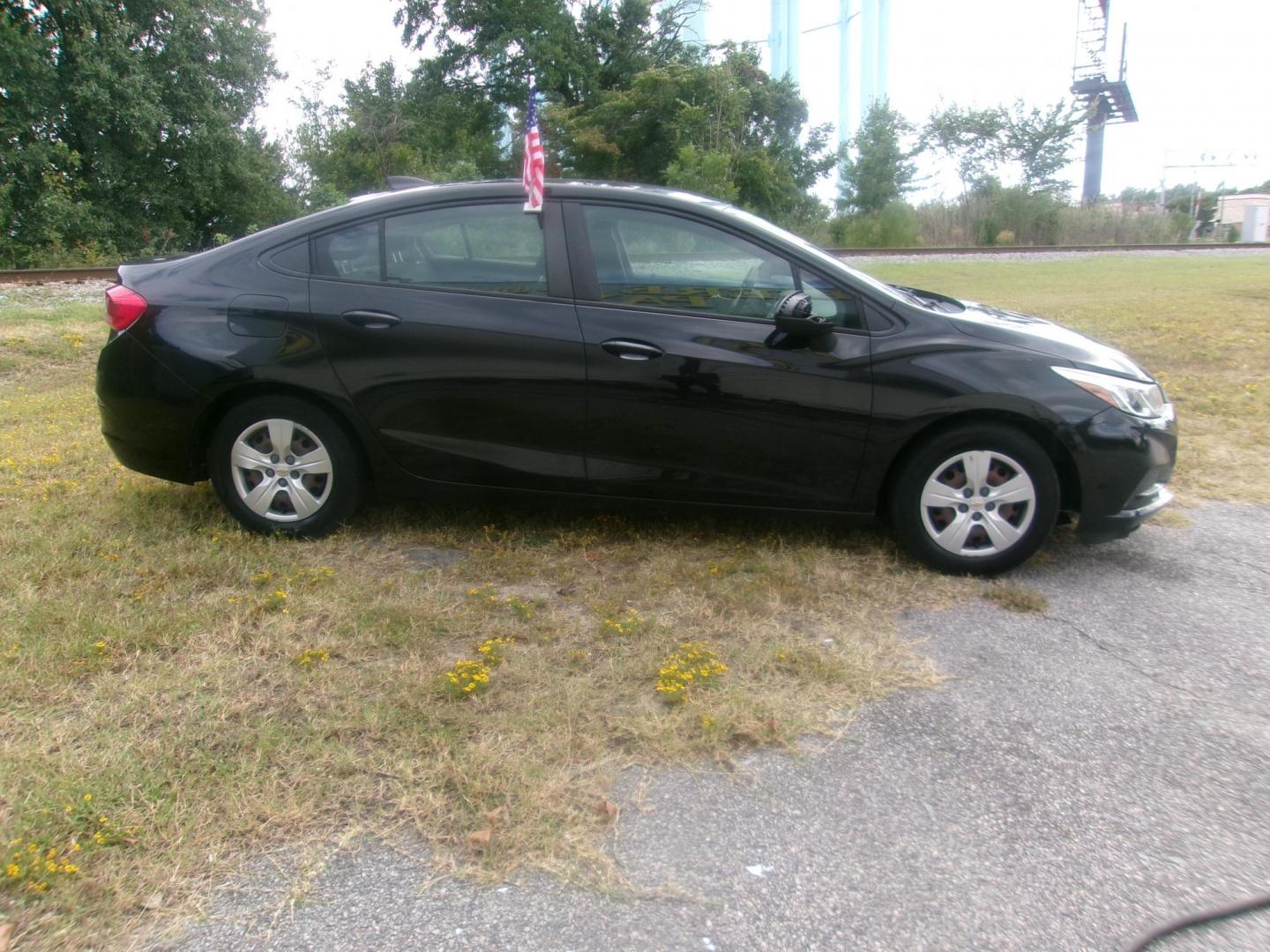 2017 Black Chevrolet Cruze LS Auto (1G1BC5SM3H7) with an 1.4L L4 DOHC 16V TURBO engine, 6A transmission, located at 2553 Airline Blvd, Portsmouth, VA, 23701, (757) 488-8331, 36.813889, -76.357597 - Photo#4