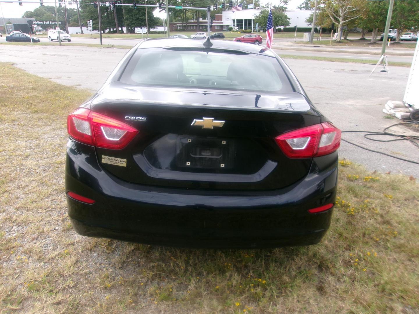 2017 Black Chevrolet Cruze LS Auto (1G1BC5SM3H7) with an 1.4L L4 DOHC 16V TURBO engine, 6A transmission, located at 2553 Airline Blvd, Portsmouth, VA, 23701, (757) 488-8331, 36.813889, -76.357597 - Photo#6