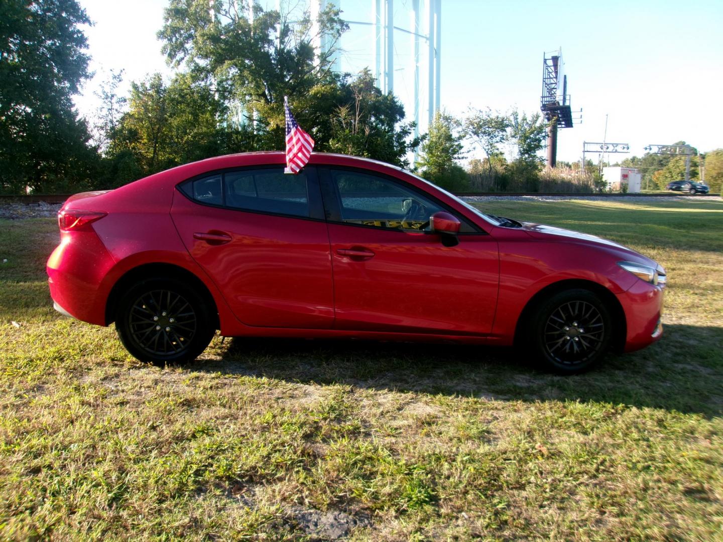 2017 Red Mazda MAZDA3 i Sport AT 4-Door (3MZBN1U77HM) with an 2.0L L4 DOHC 16V engine, 6A transmission, located at 2553 Airline Blvd, Portsmouth, VA, 23701, (757) 488-8331, 36.813889, -76.357597 - ***VEHICLE TERMS*** Down Payment: $899 Weekly Payment: $115 APR: 23.9% Repayment Terms: 42 Months *** CALL ELIZABETH SMITH - DIRECTOR OF MARKETING @ 757-488-8331 TO SCHEDULE YOUR APPOINTMENT TODAY AND GET PRE-APPROVED RIGHT OVER THE PHONE*** - Photo#4