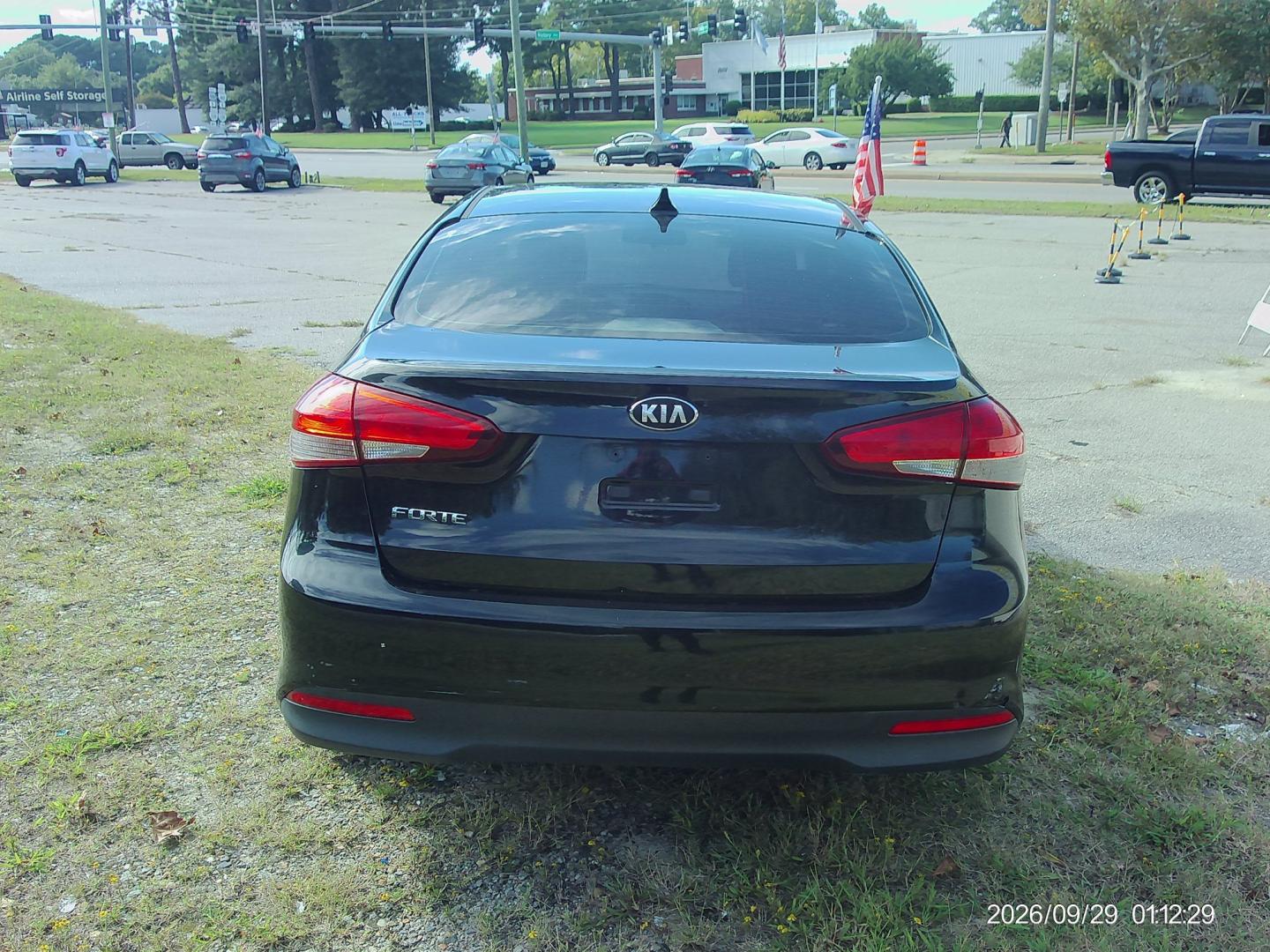 2018 Black Kia Forte LX 6M (3KPFK4A74JE) with an 2.0L L4 DOHC 16V engine, 6M transmission, located at 2553 Airline Blvd, Portsmouth, VA, 23701, (757) 488-8331, 36.813889, -76.357597- Photo#6