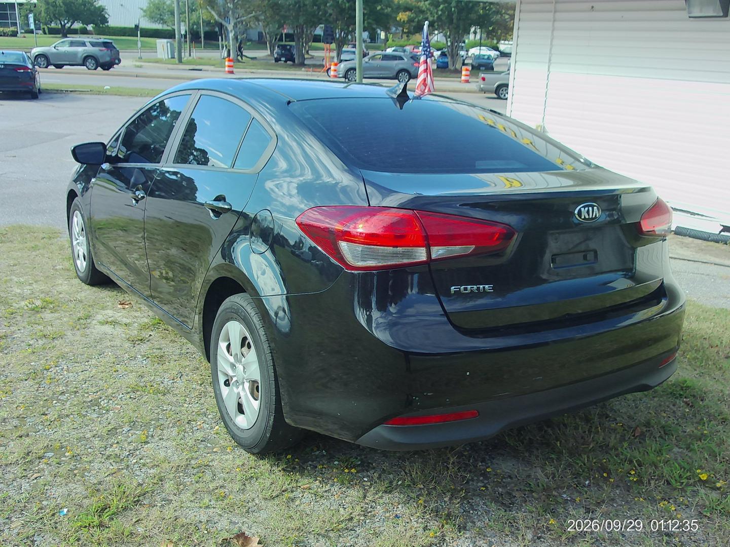 2018 Black Kia Forte LX 6M (3KPFK4A74JE) with an 2.0L L4 DOHC 16V engine, 6M transmission, located at 2553 Airline Blvd, Portsmouth, VA, 23701, (757) 488-8331, 36.813889, -76.357597- Photo#7