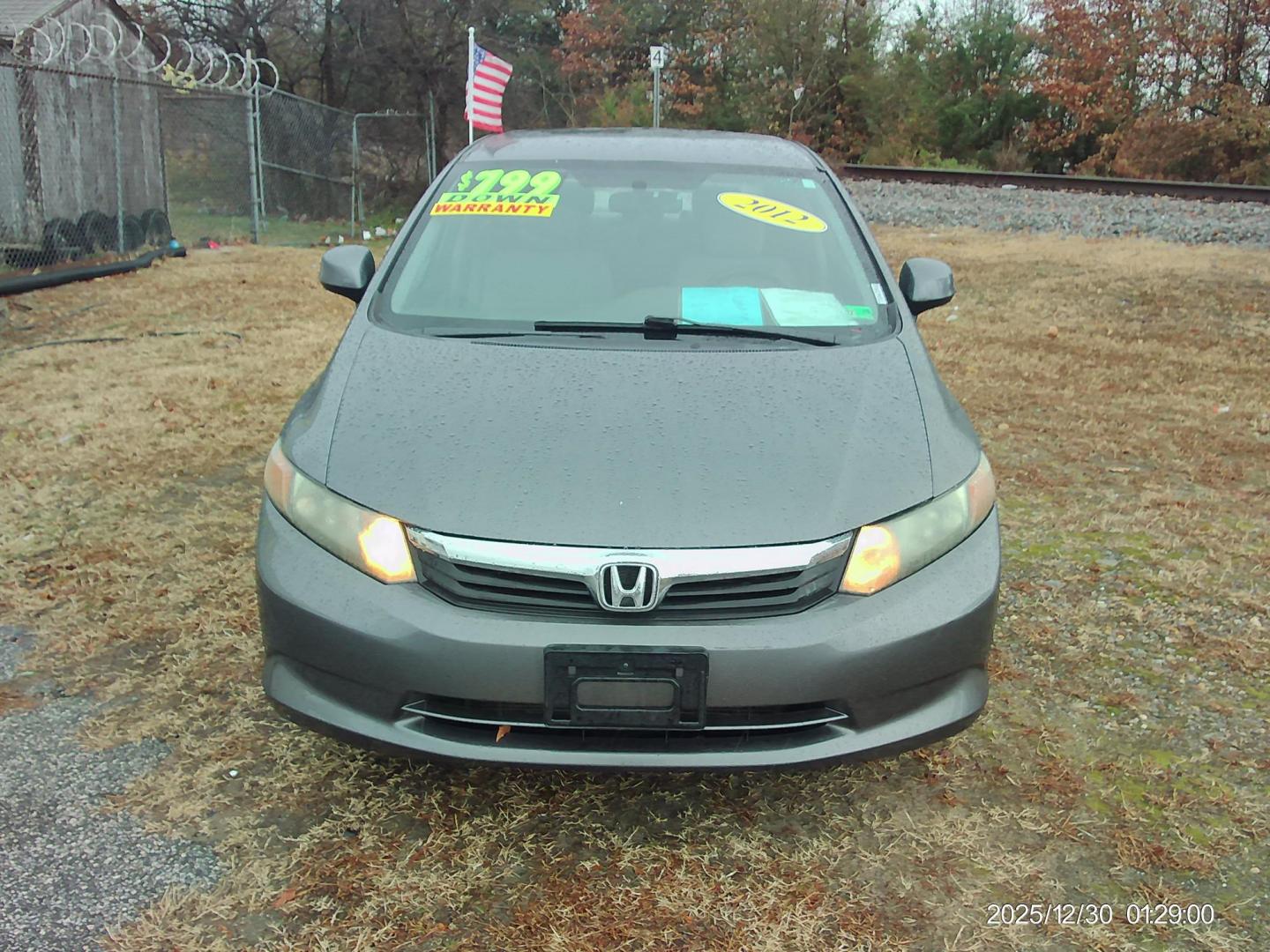 2012 Gray Honda Civic LX Sedan 5-Speed AT (19XFB2F59CE) with an 1.8L L4 SOHC 16V engine, 5-Speed Automatic transmission, located at 2553 Airline Blvd, Portsmouth, VA, 23701, (757) 488-8331, 36.813889, -76.357597 - ***VEHICLE TERMS*** Down Payment: $799 Weekly Payment: $110 APR: 23.9% Repayment Terms: 42 Months *** CALL ELIZABETH SMITH - DIRECTOR OF MARKETING @ 757-488-8331 TO SCHEDULE YOUR APPOINTMENT TODAY AND GET PRE-APPROVED RIGHT OVER THE PHONE*** - Photo#2