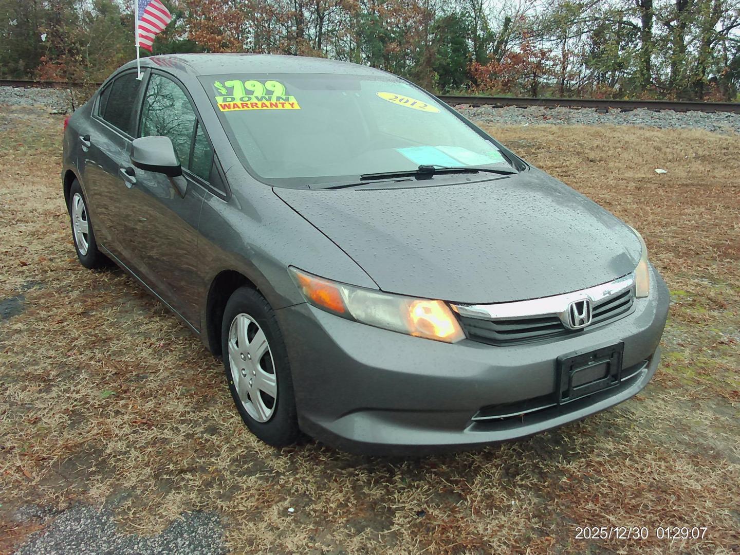 2012 Gray Honda Civic LX Sedan 5-Speed AT (19XFB2F59CE) with an 1.8L L4 SOHC 16V engine, 5-Speed Automatic transmission, located at 2553 Airline Blvd, Portsmouth, VA, 23701, (757) 488-8331, 36.813889, -76.357597 - ***VEHICLE TERMS*** Down Payment: $799 Weekly Payment: $110 APR: 23.9% Repayment Terms: 42 Months *** CALL ELIZABETH SMITH - DIRECTOR OF MARKETING @ 757-488-8331 TO SCHEDULE YOUR APPOINTMENT TODAY AND GET PRE-APPROVED RIGHT OVER THE PHONE*** - Photo#3