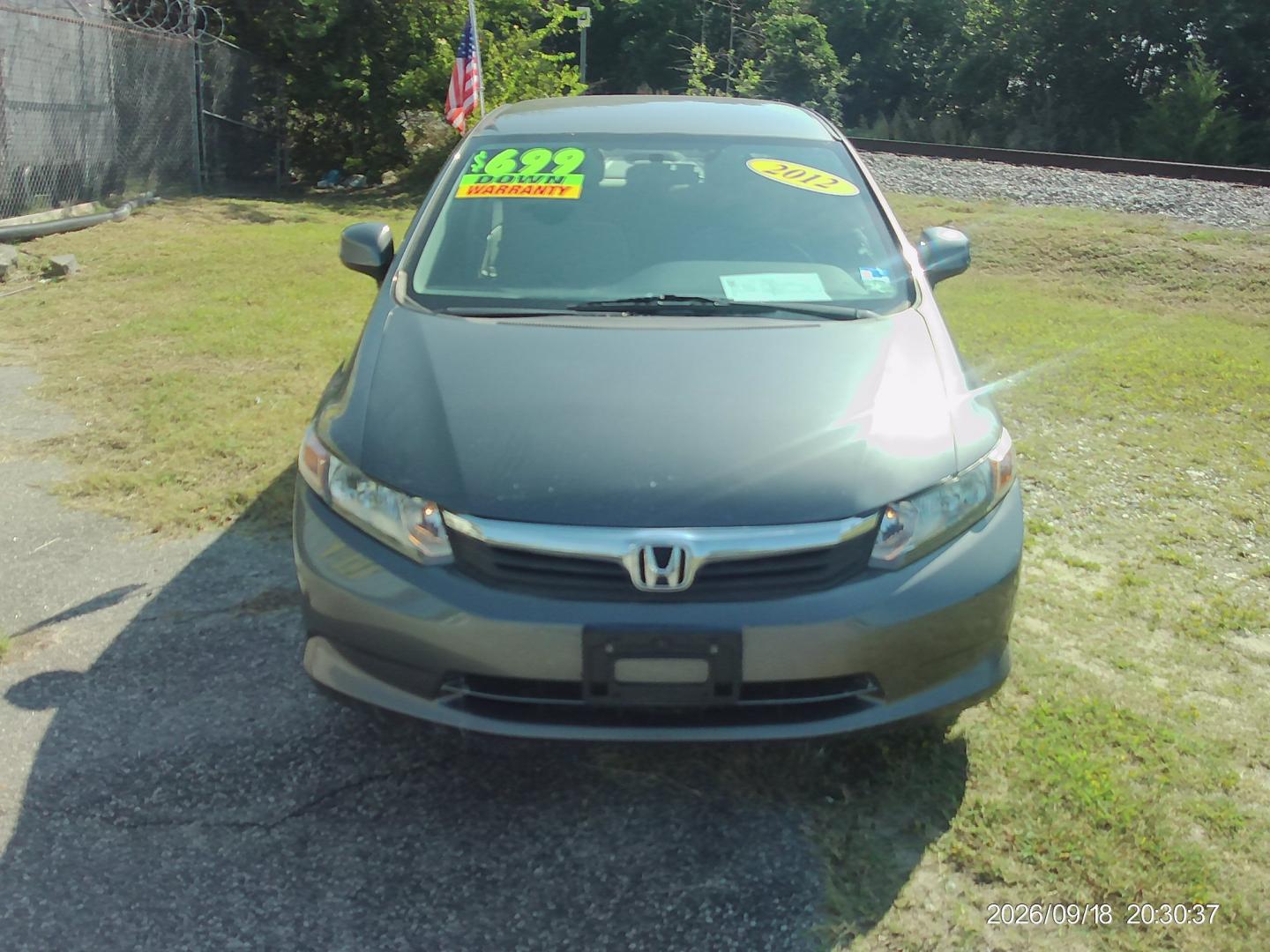 2012 Gray Honda Civic LX Sedan 5-Speed AT (19XFB2F59CE) with an 1.8L L4 SOHC 16V engine, 5-Speed Automatic transmission, located at 2553 Airline Blvd, Portsmouth, VA, 23701, (757) 488-8331, 36.813889, -76.357597 - ***VEHICLE TERMS*** Down Payment: $699 Weekly Payment: $110 APR: 23.9% Repayment Terms: 42 Months *** CALL ELIZABETH SMITH - DIRECTOR OF MARKETING @ 757-488-8331 TO SCHEDULE YOUR APPOINTMENT TODAY AND GET PRE-APPROVED RIGHT OVER THE PHONE***- Photo#2