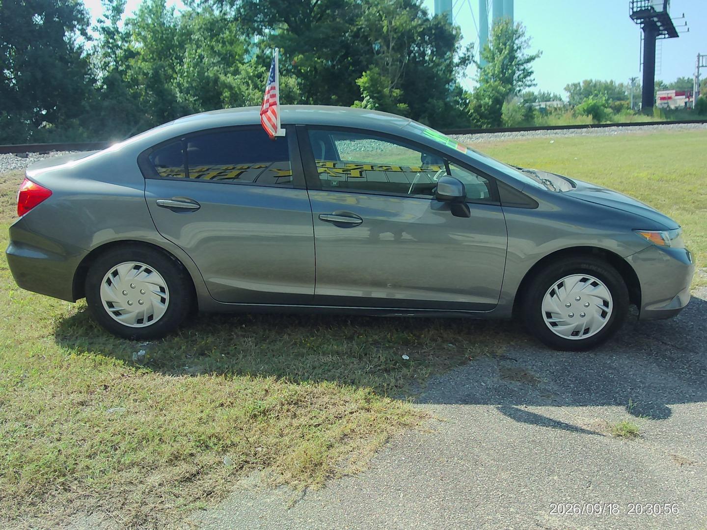 2012 Gray Honda Civic LX Sedan 5-Speed AT (19XFB2F59CE) with an 1.8L L4 SOHC 16V engine, 5-Speed Automatic transmission, located at 2553 Airline Blvd, Portsmouth, VA, 23701, (757) 488-8331, 36.813889, -76.357597 - ***VEHICLE TERMS*** Down Payment: $699 Weekly Payment: $110 APR: 23.9% Repayment Terms: 42 Months *** CALL ELIZABETH SMITH - DIRECTOR OF MARKETING @ 757-488-8331 TO SCHEDULE YOUR APPOINTMENT TODAY AND GET PRE-APPROVED RIGHT OVER THE PHONE***- Photo#4