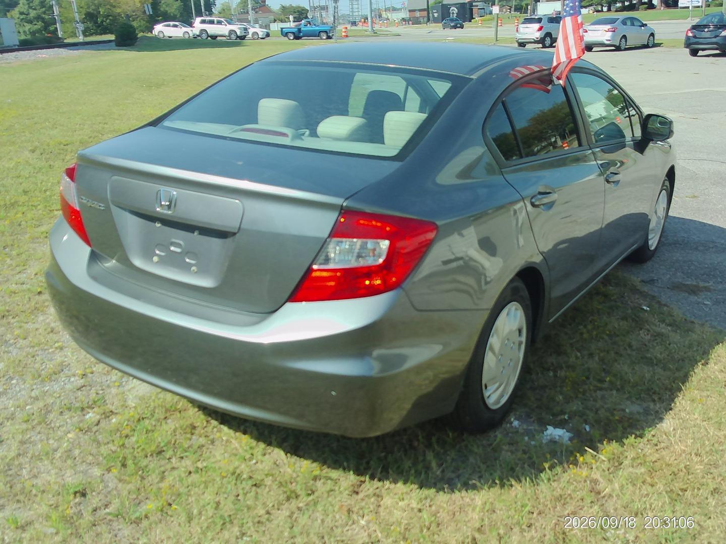 2012 Gray Honda Civic LX Sedan 5-Speed AT (19XFB2F59CE) with an 1.8L L4 SOHC 16V engine, 5-Speed Automatic transmission, located at 2553 Airline Blvd, Portsmouth, VA, 23701, (757) 488-8331, 36.813889, -76.357597 - ***VEHICLE TERMS*** Down Payment: $699 Weekly Payment: $110 APR: 23.9% Repayment Terms: 42 Months *** CALL ELIZABETH SMITH - DIRECTOR OF MARKETING @ 757-488-8331 TO SCHEDULE YOUR APPOINTMENT TODAY AND GET PRE-APPROVED RIGHT OVER THE PHONE***- Photo#5