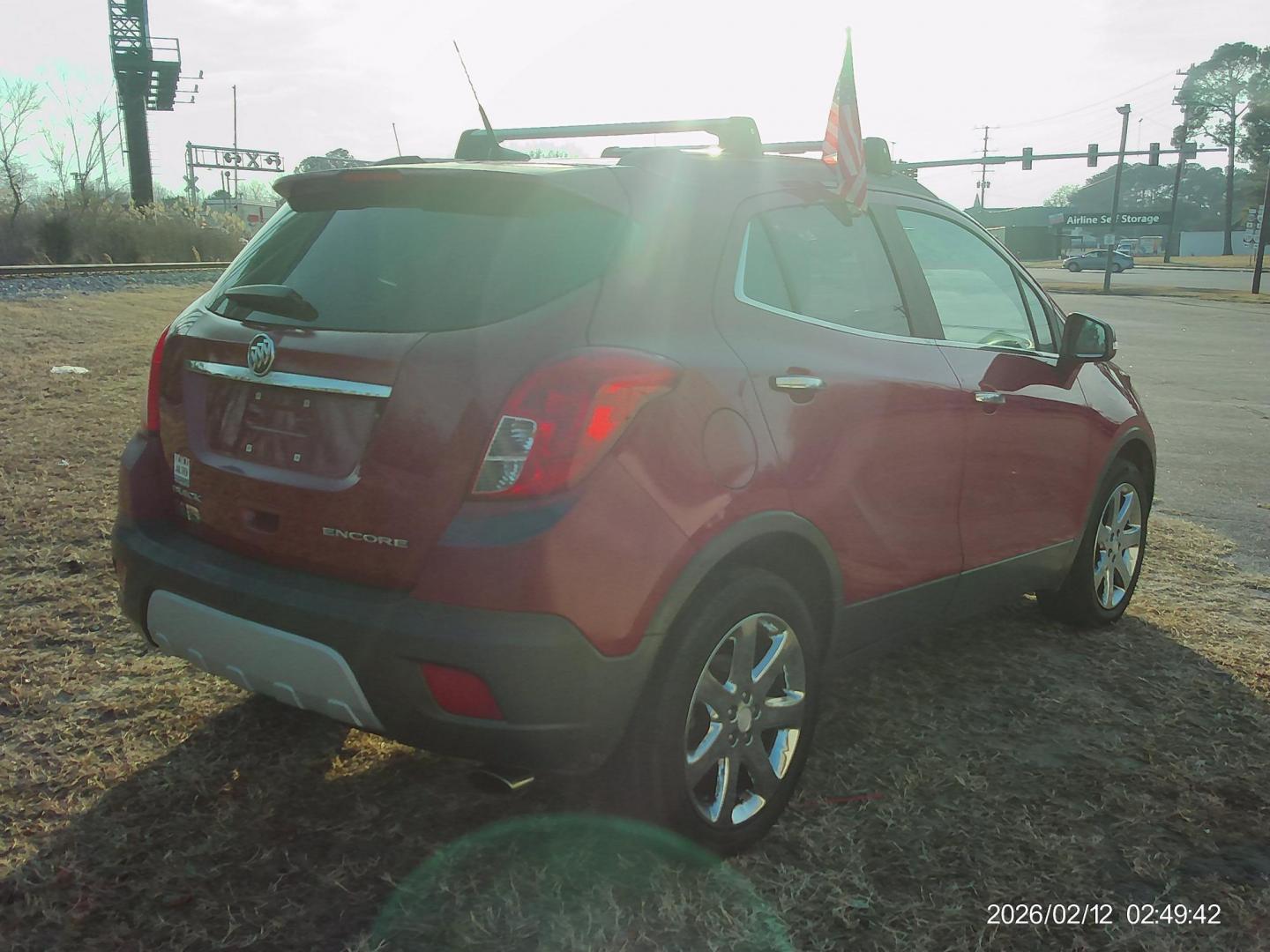 2014 Red Buick Encore Leather FWD (KL4CJCSB0EB) with an 1.4L L4 DOHC 16V TURBO engine, 6-Speed Automatic transmission, located at 2553 Airline Blvd, Portsmouth, VA, 23701, (757) 488-8331, 36.813889, -76.357597 - ***VEHICLE TERMS*** Down Payment: $599 Weekly Payment: $100 APR: 23.9% Repayment Terms: 42 Months *** CALL ELIZABETH SMITH - DIRECTOR OF MARKETING @ 757-488-8331 TO SCHEDULE YOUR APPOINTMENT TODAY AND GET PRE-APPROVED RIGHT OVER THE PHONE*** - Photo#5