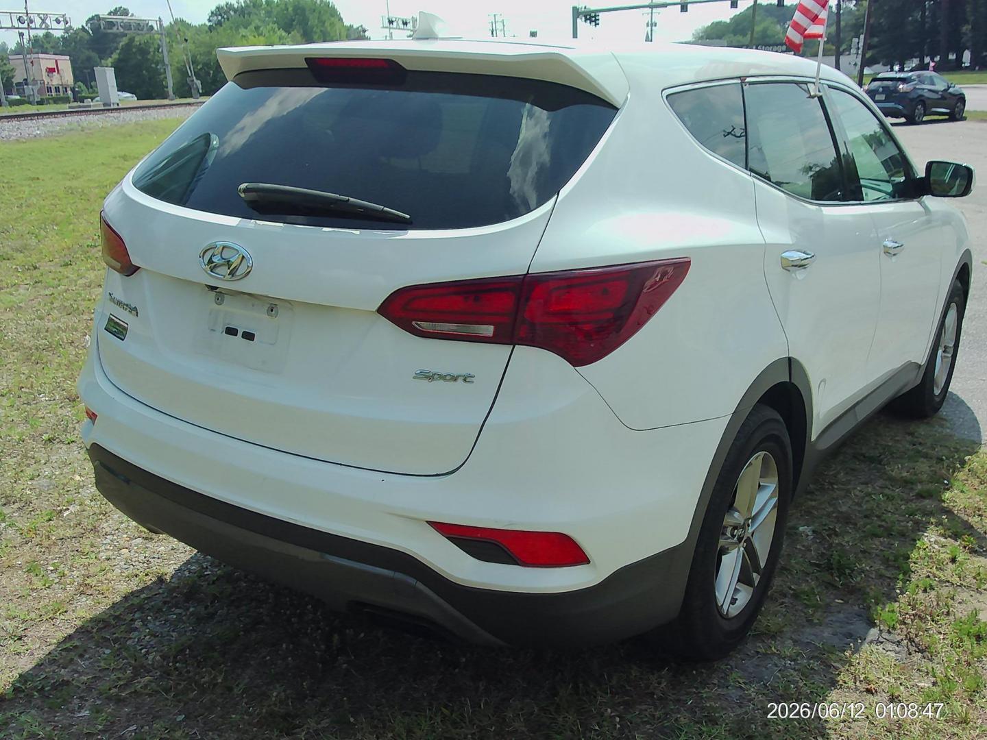 2017 White Hyundai Santa Fe Sport 2.4 FWD (5XYZT3LBXHG) with an 2.4L L4 DOHC 16V engine, 6A transmission, located at 2553 Airline Blvd, Portsmouth, VA, 23701, (757) 488-8331, 36.813889, -76.357597 - ***VEHICLE TERMS*** Down Payment: $699 Weekly Payment: $110 APR: 23.9% Repayment Terms: 42 Months *** CALL ELIZABETH SMITH - DIRECTOR OF MARKETING @ 757-488-8331 TO SCHEDULE YOUR APPOINTMENT TODAY AND GET PRE-APPROVED RIGHT OVER THE PHONE***- Photo#5