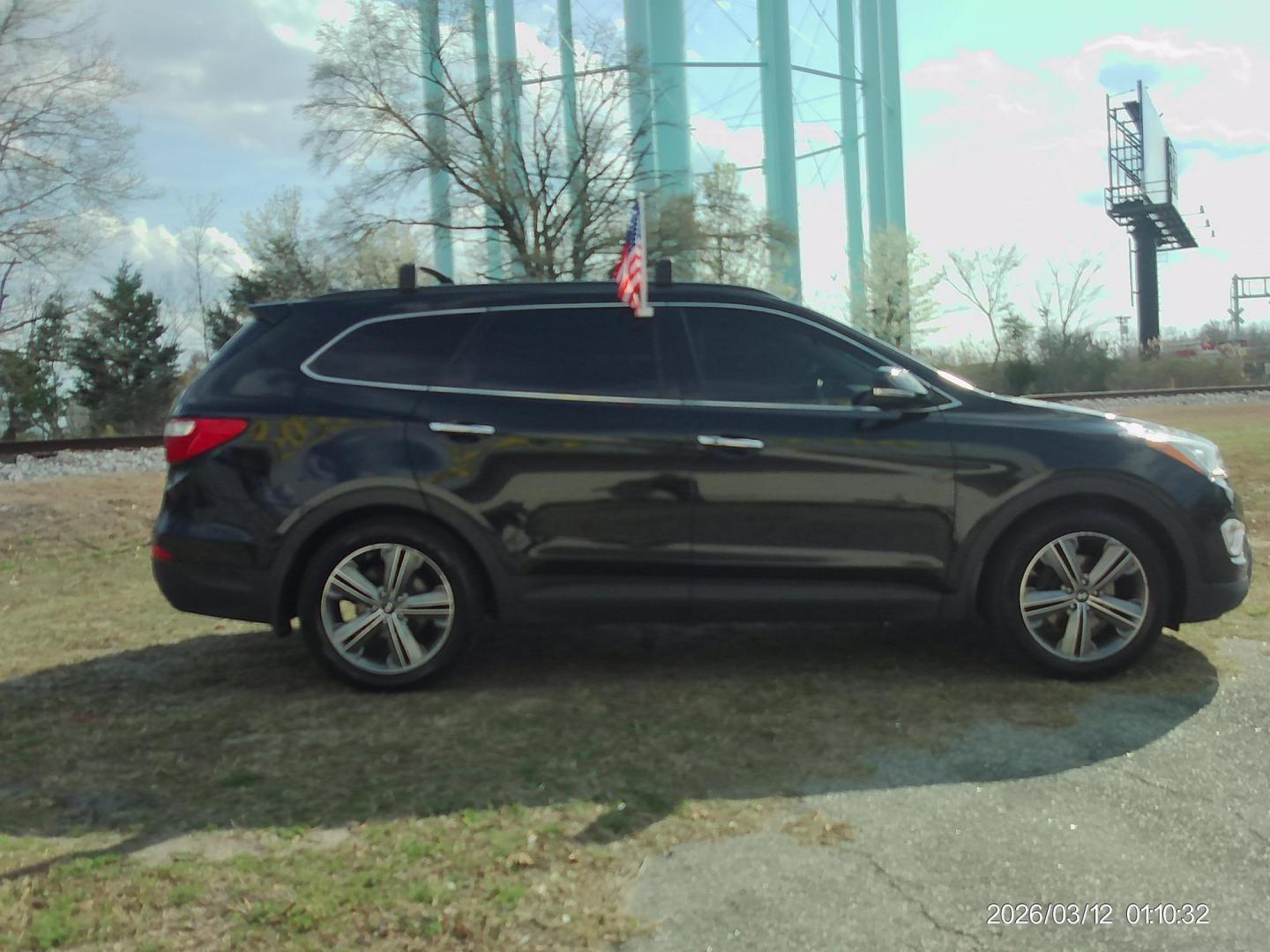 2015 Black Hyundai Santa Fe Limited FWD (KM8SR4HF5FU) with an 3.3L V6 DOHC 24V engine, 6-Speed Automatic transmission, located at 2553 Airline Blvd, Portsmouth, VA, 23701, (757) 488-8331, 36.813889, -76.357597 - ***VEHICLE TERMS*** Down Payment: $999 Weekly Payment: $120 APR: 23.9% Repayment Terms: 42 Months *** CALL ELIZABETH SMITH - DIRECTOR OF MARKETING @ 757-488-8331 TO SCHEDULE YOUR APPOINTMENT TODAY AND GET PRE-APPROVED RIGHT OVER THE PHONE*** - Photo#4