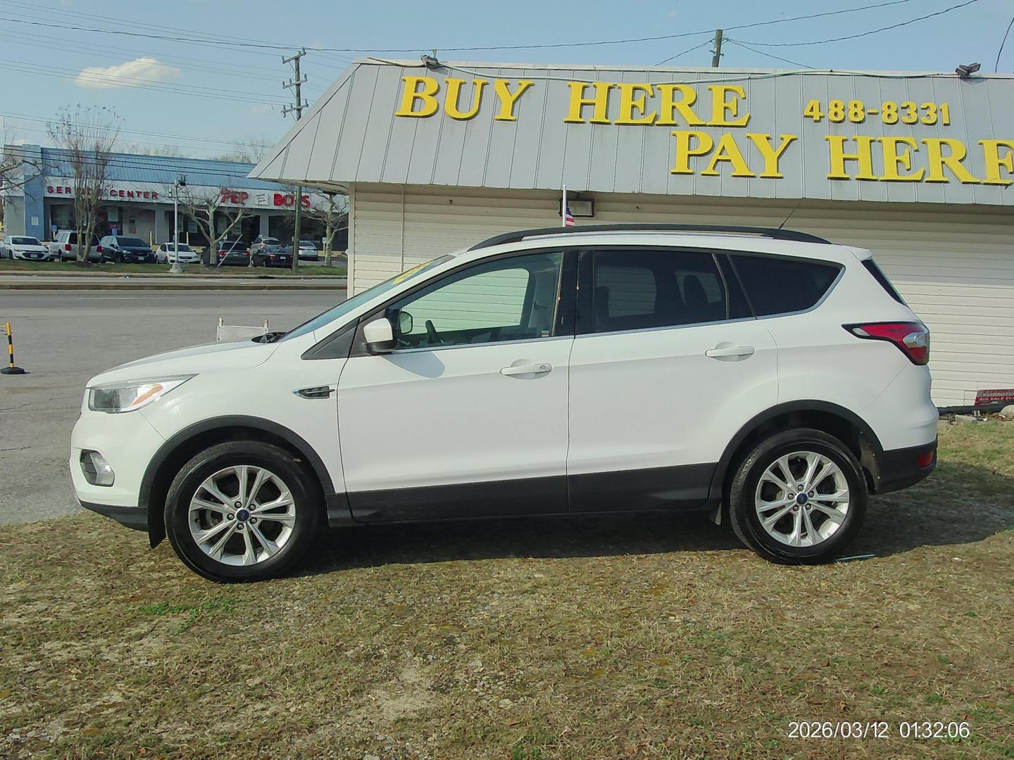 2018 White Ford Escape SE FWD (1FMCU0GD8JU) with an 1.5L L4 DOHC 16V engine, 6A transmission, located at 2553 Airline Blvd, Portsmouth, VA, 23701, (757) 488-8331, 36.813889, -76.357597 - ***VEHICLE TERMS*** Down Payment: $999 Weekly Payment: $120 APR: 23.9% Repayment Terms: 42 Months *** CALL ELIZABETH SMITH - DIRECTOR OF MARKETING @ 757-488-8331 TO SCHEDULE YOUR APPOINTMENT TODAY AND GET PRE-APPROVED RIGHT OVER THE PHONE*** - Photo#0
