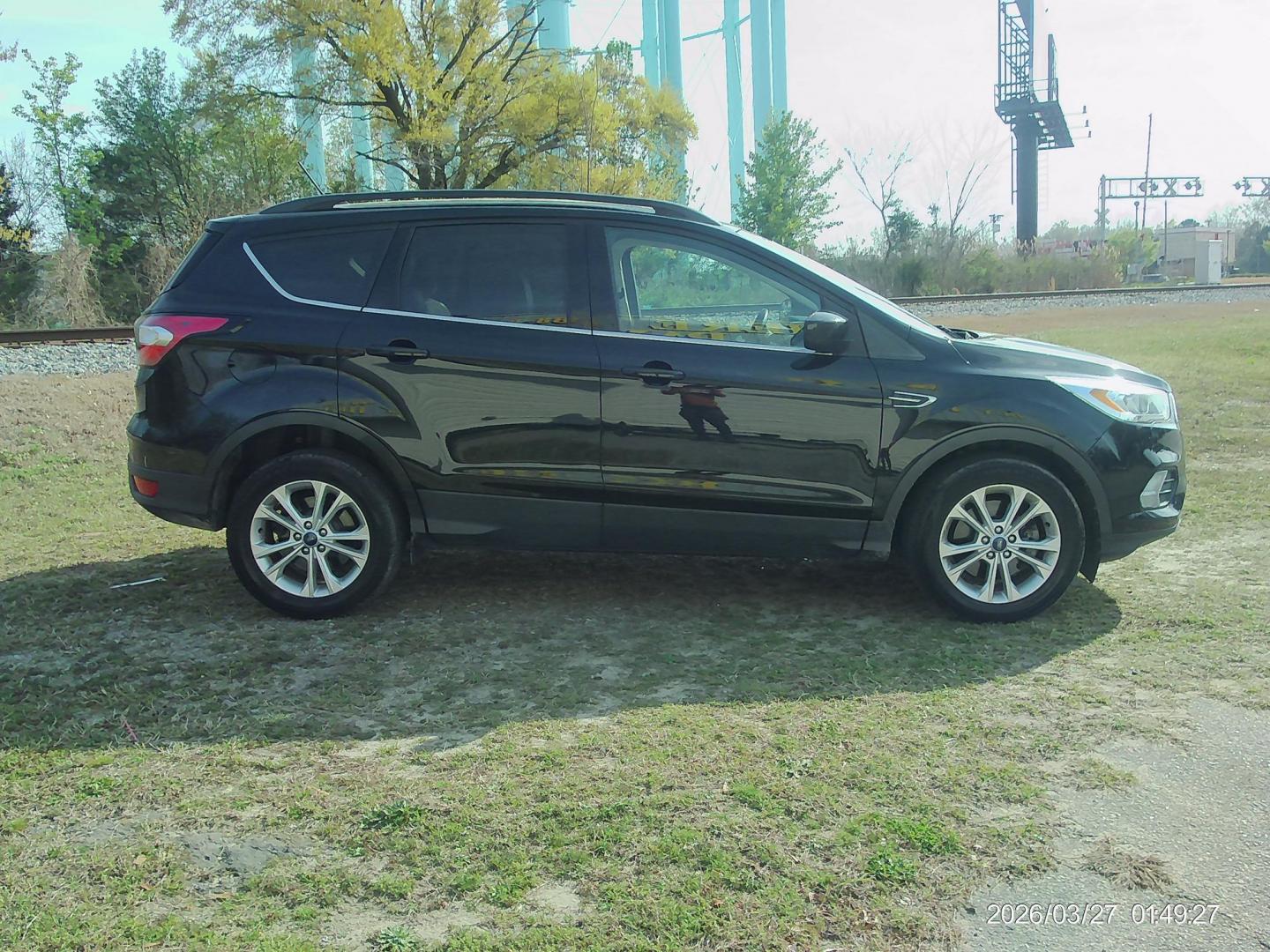 2018 Black Ford Escape SEL 4WD (1FMCU9HD9JU) with an 1.5L L4 DOHC 16V engine, 6A transmission, located at 2553 Airline Blvd, Portsmouth, VA, 23701, (757) 488-8331, 36.813889, -76.357597 - ***VEHICLE TERMS*** Down Payment: $999 Weekly Payment: $120 APR: 23.9% Repayment Terms: 42 Months *** CALL ELIZABETH SMITH - DIRECTOR OF MARKETING @ 757-488-8331 TO SCHEDULE YOUR APPOINTMENT TODAY AND GET PRE-APPROVED RIGHT OVER THE PHONE*** - Photo#1