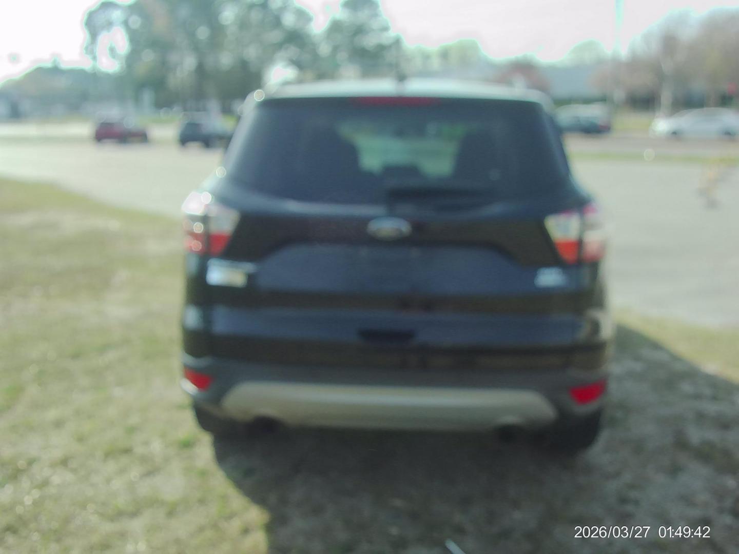 2018 Black Ford Escape SEL 4WD (1FMCU9HD9JU) with an 1.5L L4 DOHC 16V engine, 6A transmission, located at 2553 Airline Blvd, Portsmouth, VA, 23701, (757) 488-8331, 36.813889, -76.357597 - ***VEHICLE TERMS*** Down Payment: $999 Weekly Payment: $120 APR: 23.9% Repayment Terms: 42 Months *** CALL ELIZABETH SMITH - DIRECTOR OF MARKETING @ 757-488-8331 TO SCHEDULE YOUR APPOINTMENT TODAY AND GET PRE-APPROVED RIGHT OVER THE PHONE*** - Photo#3