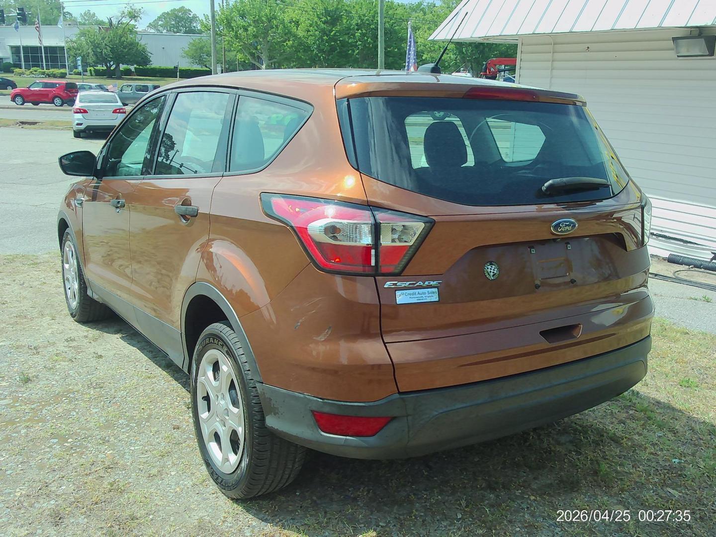 2017 Orange Ford Escape S FWD (1FMCU0F71HU) with an 2.5L L4 DOHC 16V engine, 6A transmission, located at 2553 Airline Blvd, Portsmouth, VA, 23701, (757) 488-8331, 36.813889, -76.357597 - ***VEHICLE TERMS*** Down Payment: $799 Weekly Payment: $110 APR: 23.9% Repayment Terms: 42 Months *** CALL ELIZABETH SMITH - DIRECTOR OF MARKETING @ 757-488-8331 TO SCHEDULE YOUR APPOINTMENT TODAY AND GET PRE-APPROVED RIGHT OVER THE PHONE*** - Photo#7